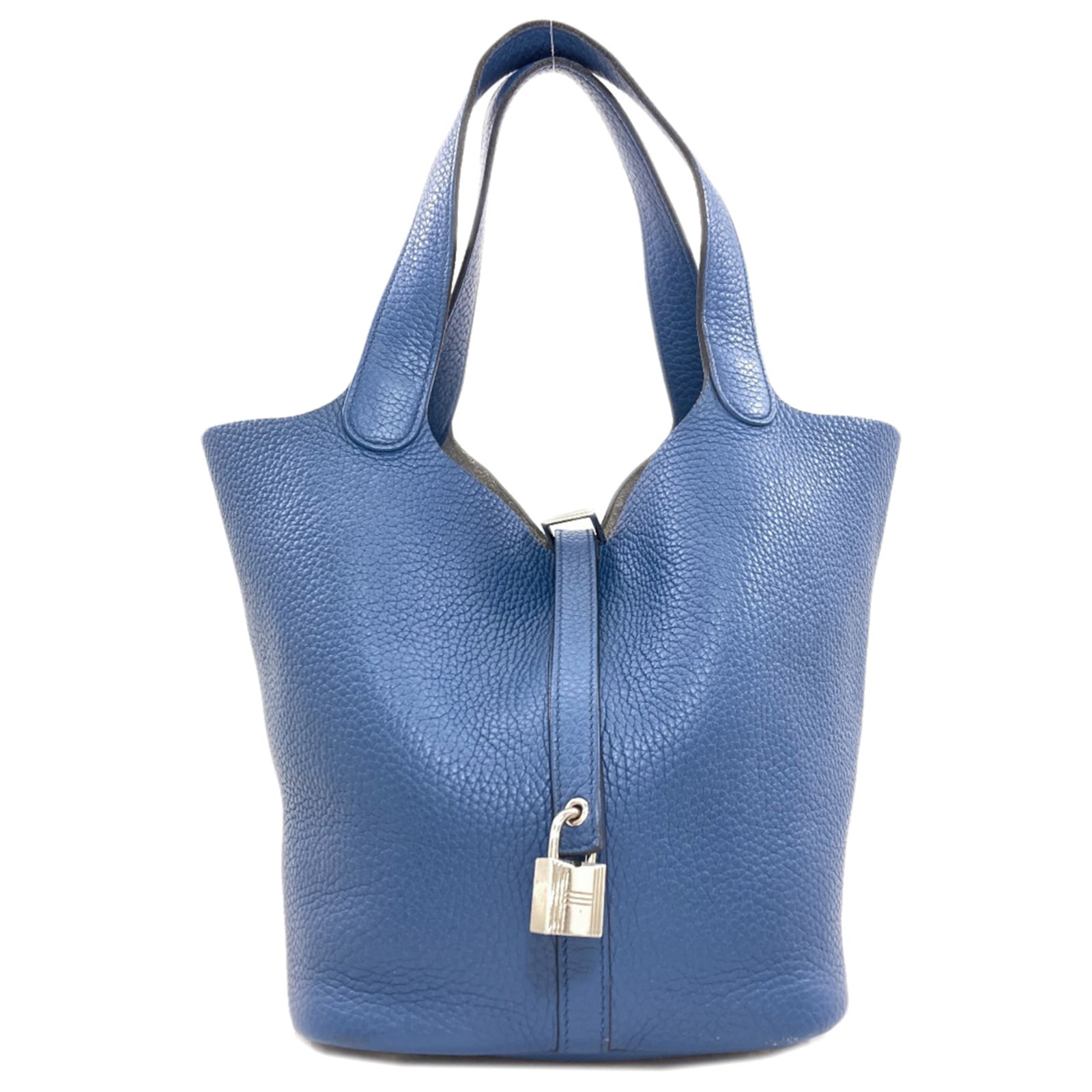 Handbag by Hermes: Handbag by Hermes Blue Hermes handbag with dimensions 22cm x 18cm x 23cm. This stylish bag features a classic design and vibrant blue color, making it a statement piece for any woman's wardrobe. Its