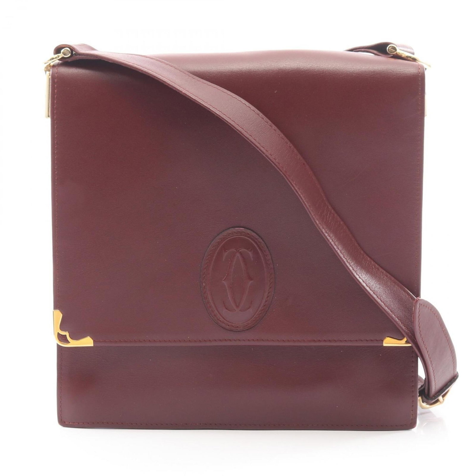 Handbag Leather Shoulder Cartier: Handbag Leather Shoulder Cartier Cartier's Bordeaux leather shoulder bag boasts sleek, sophisticated design with clean lines and elegant proportions. Measuring 21cm x 20cm x 3.5cm, it offers a spaciou