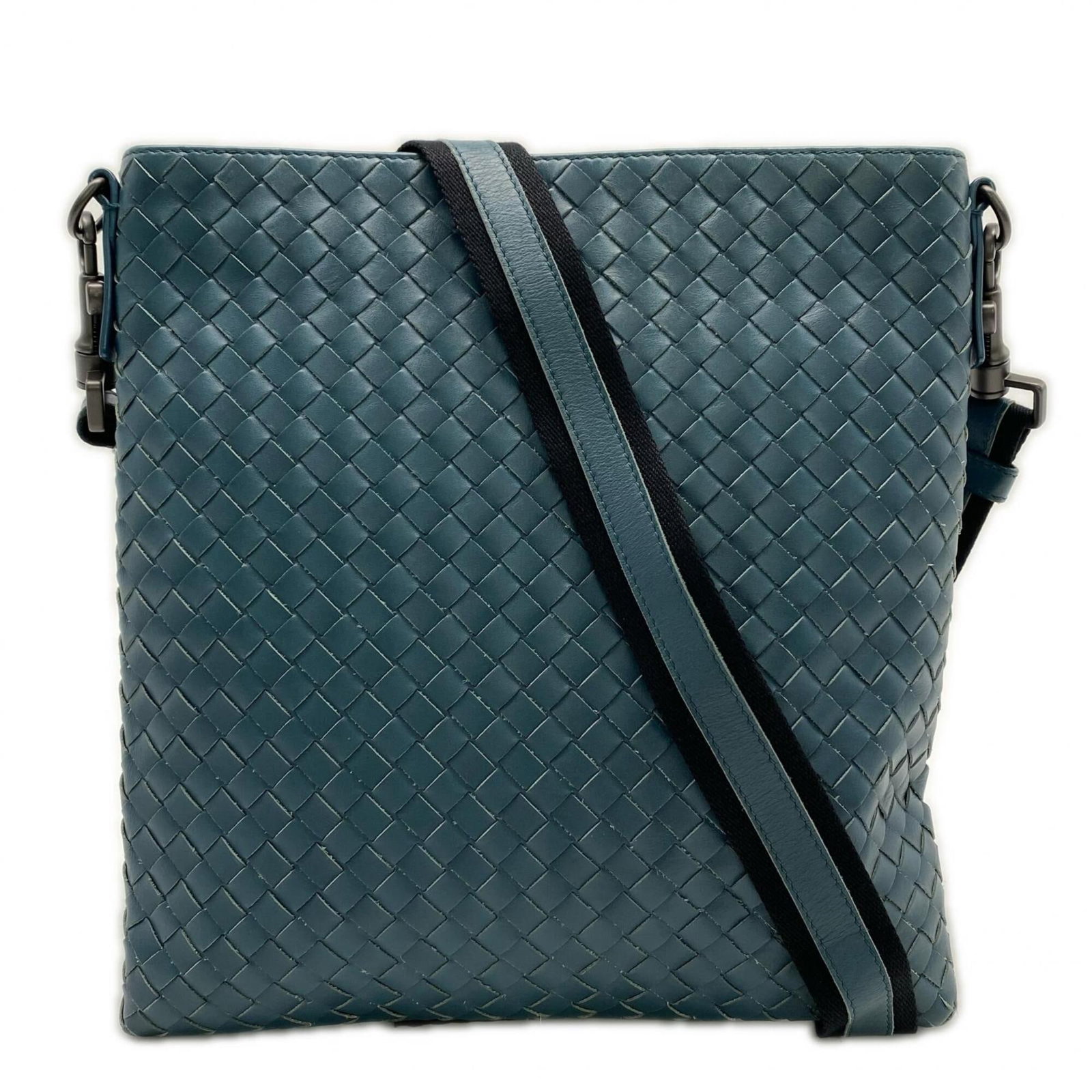 Bottega Veneta Shoulder Bag Leather: Bottega Veneta Shoulder Bag Leather Bottega Veneta's Intrecciato leather craftsmanship shines in this elegant shoulder bag, featuring a striking green hue. Made from high-quality leather, the bag