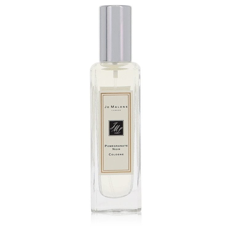 Jo Malone Pomegranate Noir by Jo Malone Cologne Spray (Unisex Unboxed) 1 oz: Jo Malone Pomegranate Noir by Jo Malone Cologne Spray (Unisex Unboxed) 1 oz Pomegranate Noir by Jo Malone Cologne Spray, a rich and woody fragrance, combines pomegranate with other fruity notes like w