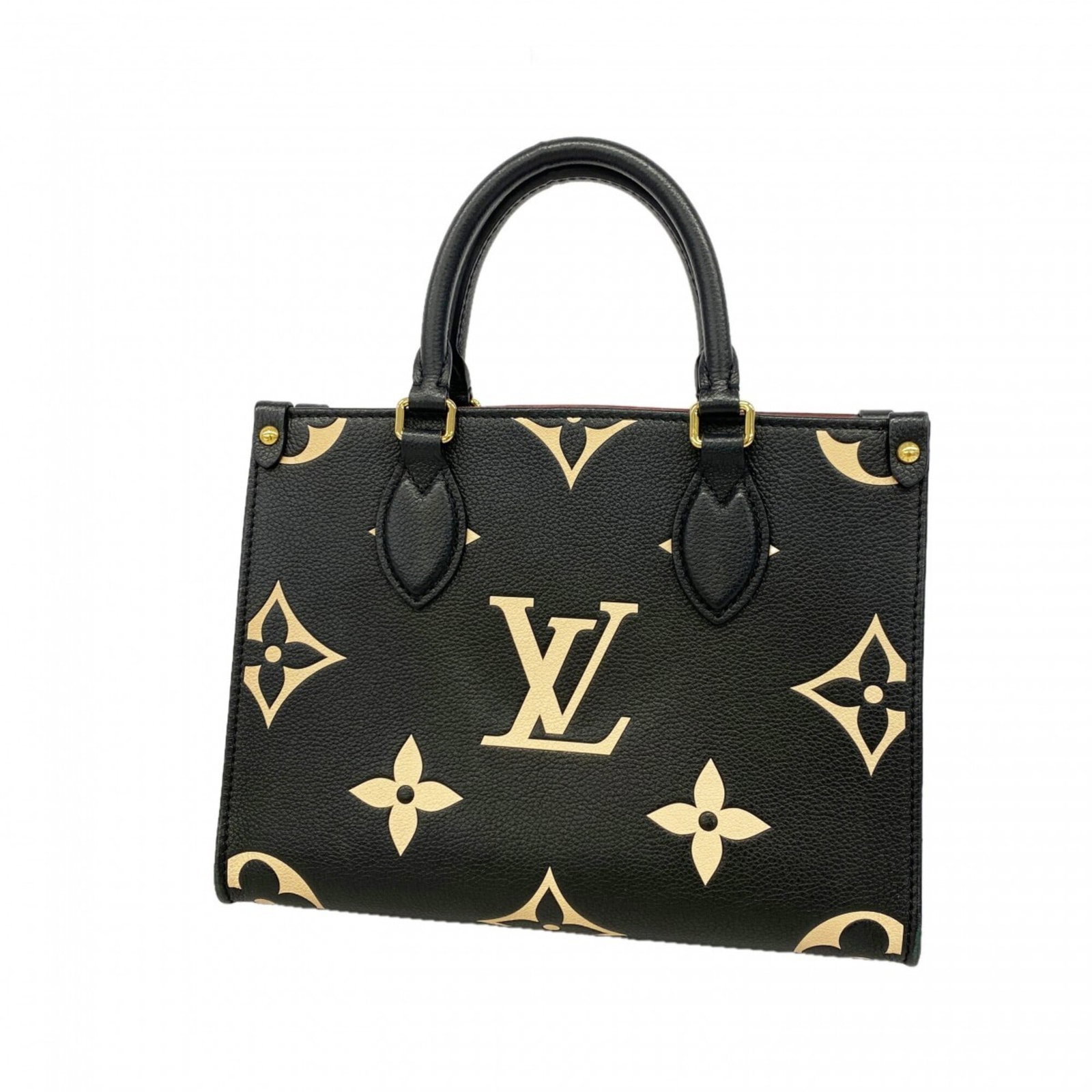 Louis Vuitton Handbag: Louis Vuitton Handbag Beige and black hues perfectly complement each other in this Louis Vuitton handbag, measuring 19cm x 25cm x 10cm. The classic design features a timeless combination of style and