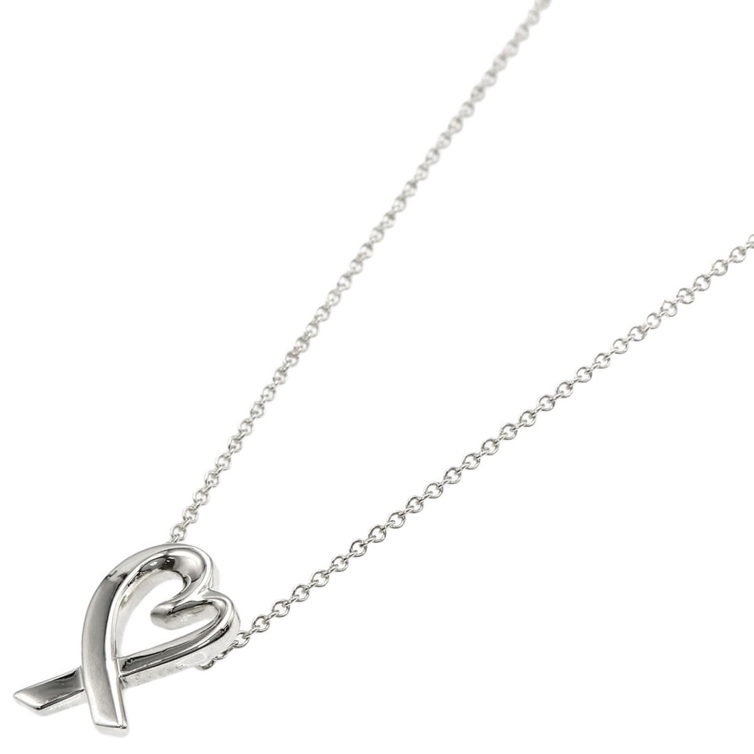 Loving Heart Necklace from Tiffany & Co: Loving Heart Necklace from Tiffany & Co Silver Loving Heart Necklace from Tiffany & Co, featuring the iconic brand's signature style and sleek design. This 16.5-inch long necklace showcases a