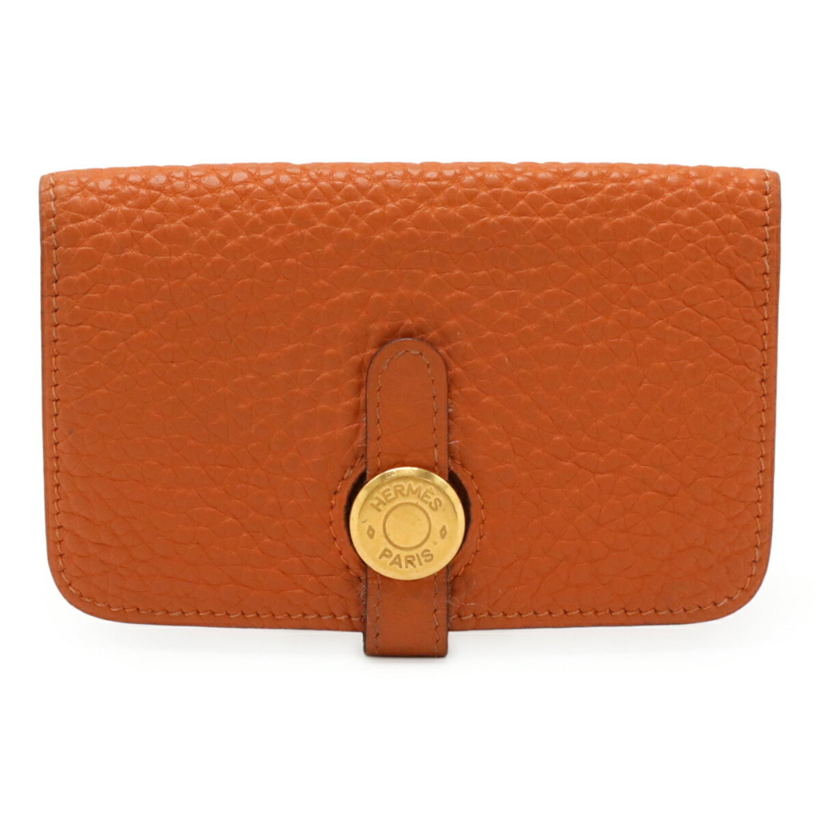 Hermes Coin Purse/ Coin Case Togo Leather: Hermes Coin Purse/ Coin Case Togo Leather Togo leather craftsmanship shines in this vibrant orange coin purse from Hermes. Measuring 7.5cm x 12cm, the compact design makes it a stylish accessory for e