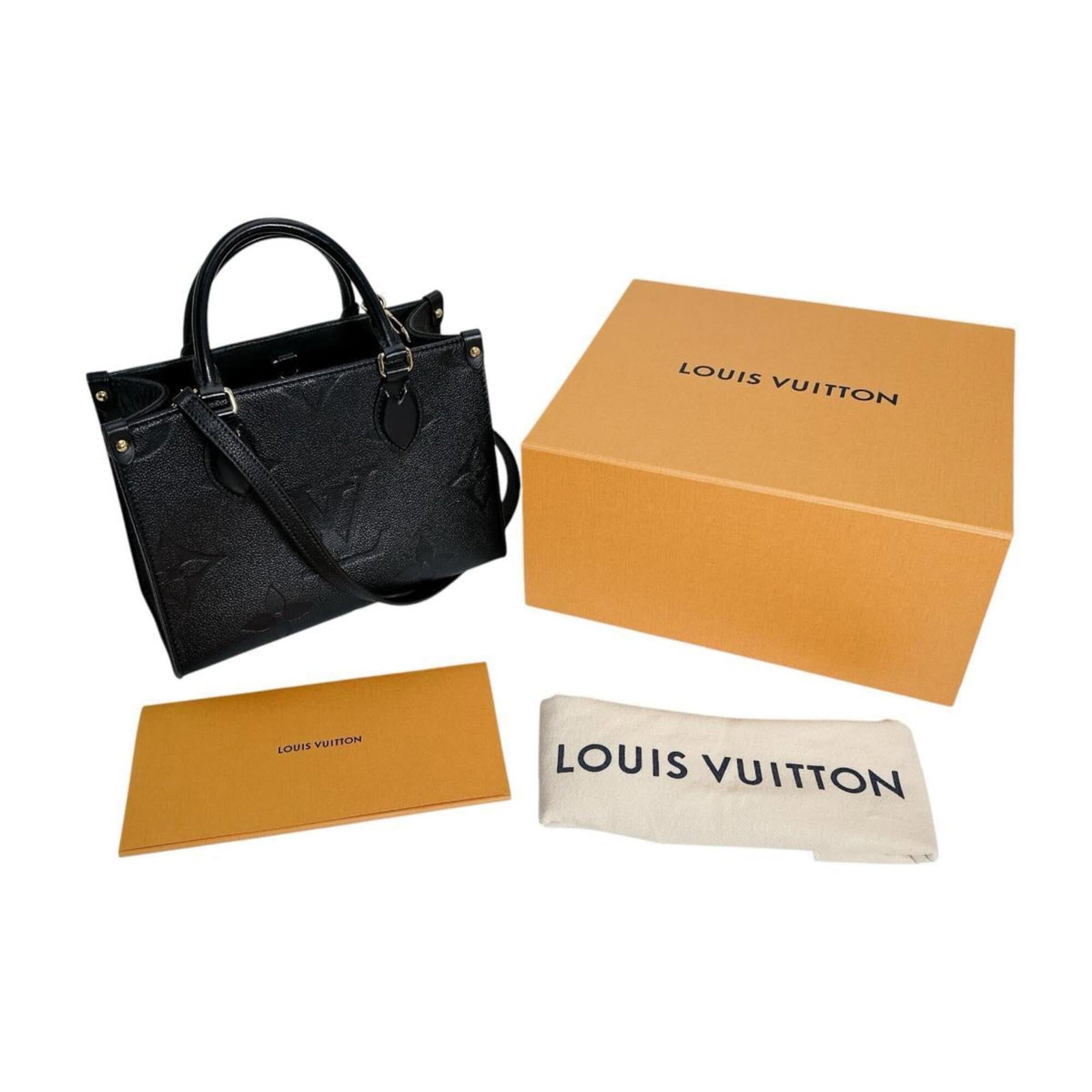 Handbag tote bag monogram Louis Vuitton: Handbag tote bag monogram Louis Vuitton Monogram Empreinte Louis Vuitton tote bag in black, featuring the iconic signature pattern. Made from high-quality materials, this stylish and functional handba