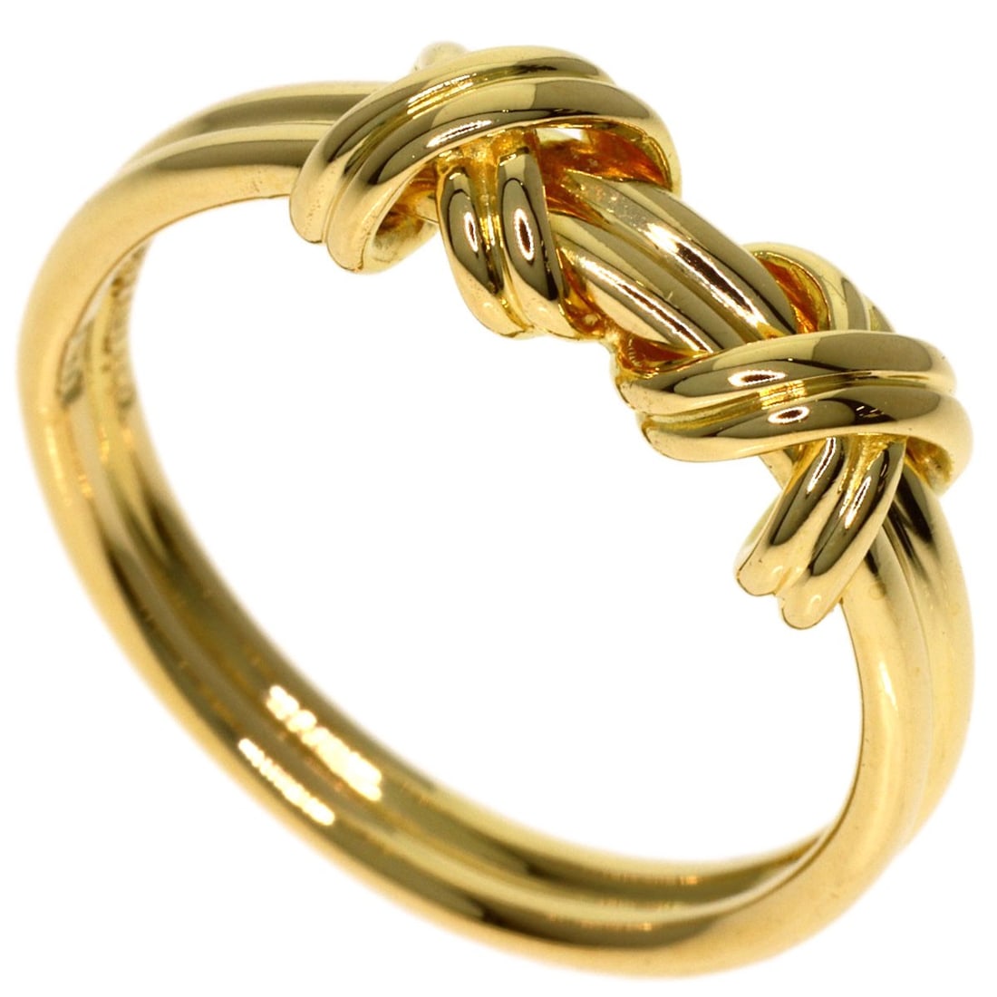 Double signature ring in yellow gold K18 by Tiffany & Co.: Double signature ring in yellow gold K18 by Tiffany & Co. K18 yellow gold Tiffany & Co. ring features a double signature, a unique touch that adds character to its elegant design. Crafted from high-qu