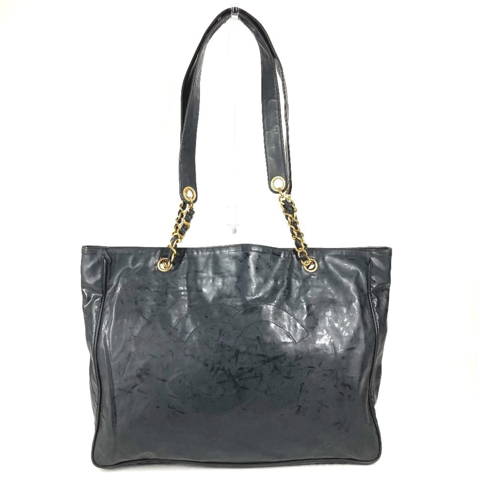 Chanel Shoulder Bag Tote Bag Coated Canvas: Chanel Shoulder Bag Tote Bag Coated Canvas Black coated canvas Chanel shoulder bag tote bag, measuring 29.5cm x 38.5cm x 9.5cm, features a classic design with a structured shape and sturdy constructio