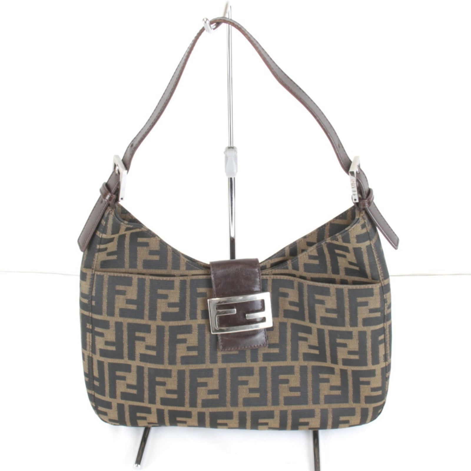 Shoulder Bag Fendi Canvas: Shoulder Bag Fendi Canvas Canvas Fendi Zucca Shoulder Bag in Khaki. This khaki canvas shoulder bag features a classic design with clean lines and a compact size, making it easy to carry everyday essen