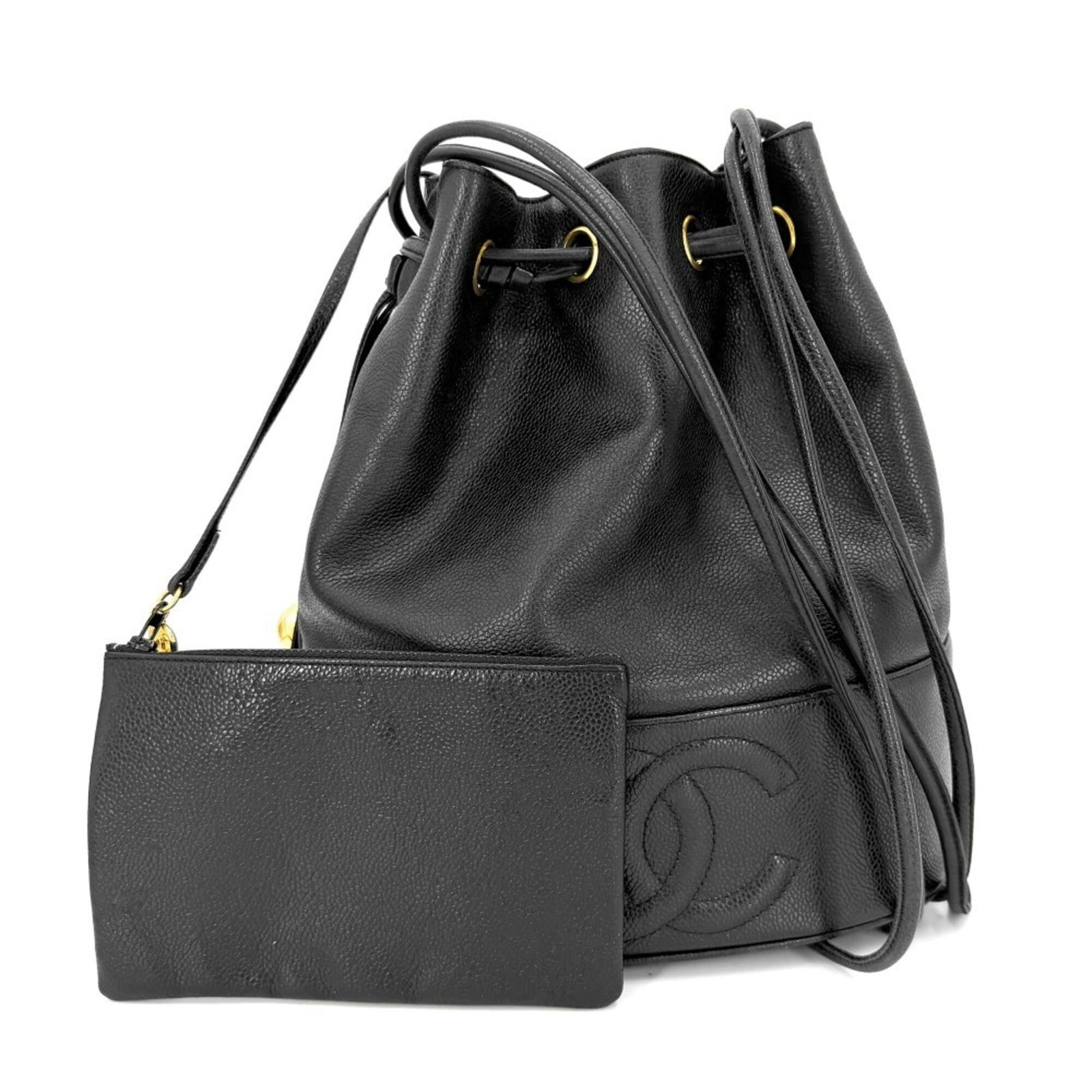Calfskin Handbag by Chanel: Calfskin Handbag by Chanel Calfskin Handbag by Chanel features a sleek, black design made from high-quality grained calfskin. This timeless piece measures 30cm x 25cm x 17cm and comes with a 60cm long