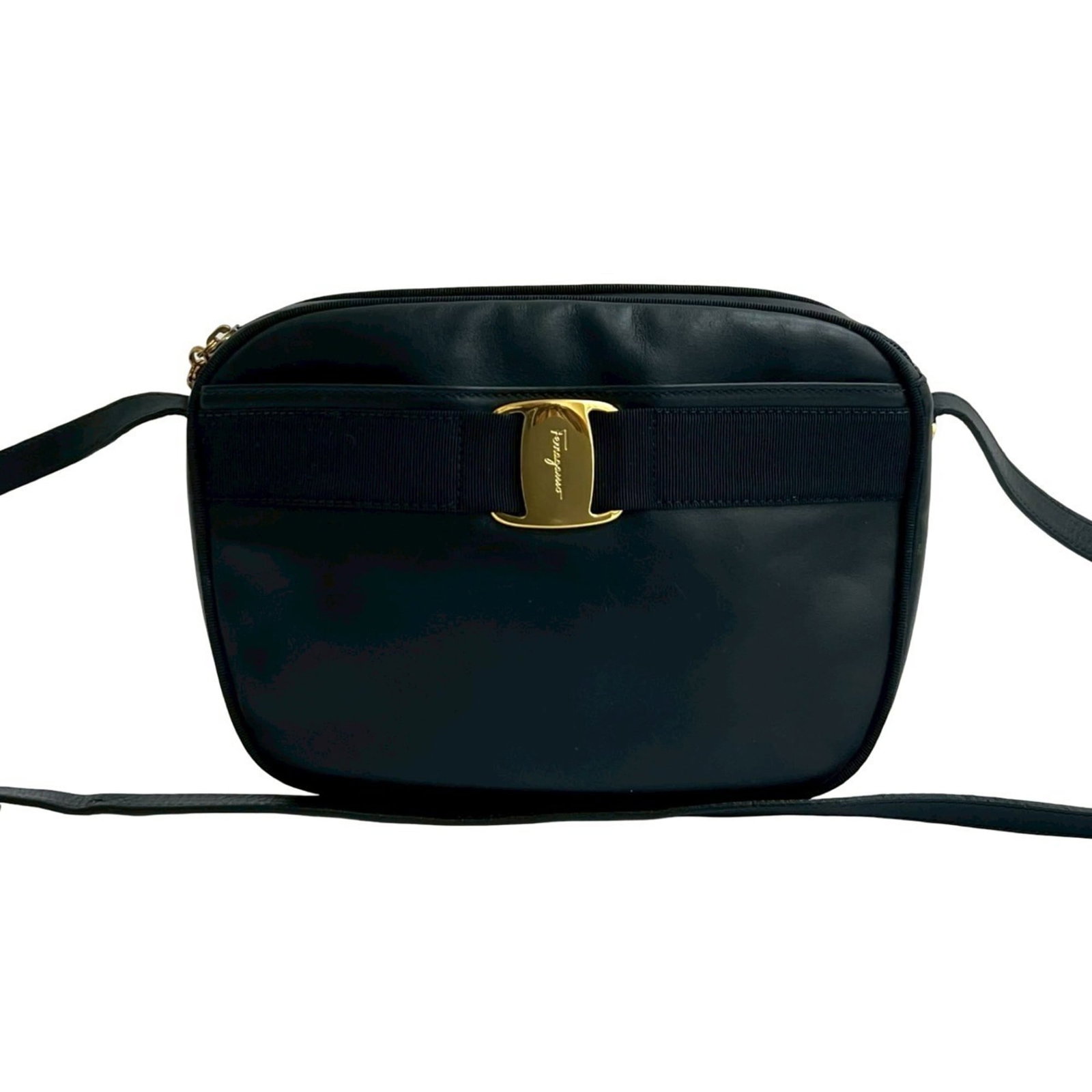 Ferragamo Leather Pochette Salvatore Bag Shoulder: Ferragamo Leather Pochette Salvatore Bag Shoulder Navy leather shoulder bag with clean lines and classic design, featuring a 17cm x 20cm x 7.5cm size that fits comfortably in the hand. The Salvatore