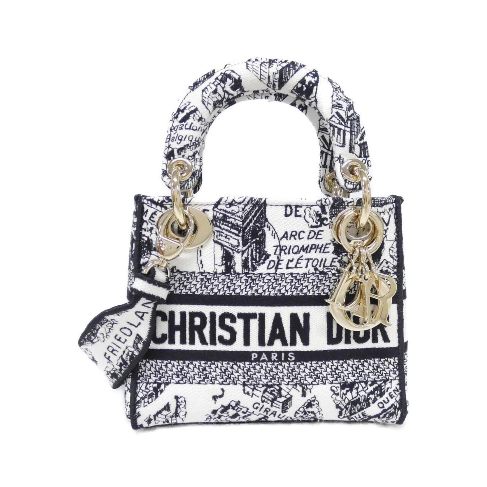 Canvas by Dior Christian: Canvas by Dior Christian Canvas by Dior Christian - A sleek and modern handbag with a canvas material, available in black and white. Measuring 14cm x 17cm x 7cm, it features a compact size perfect for