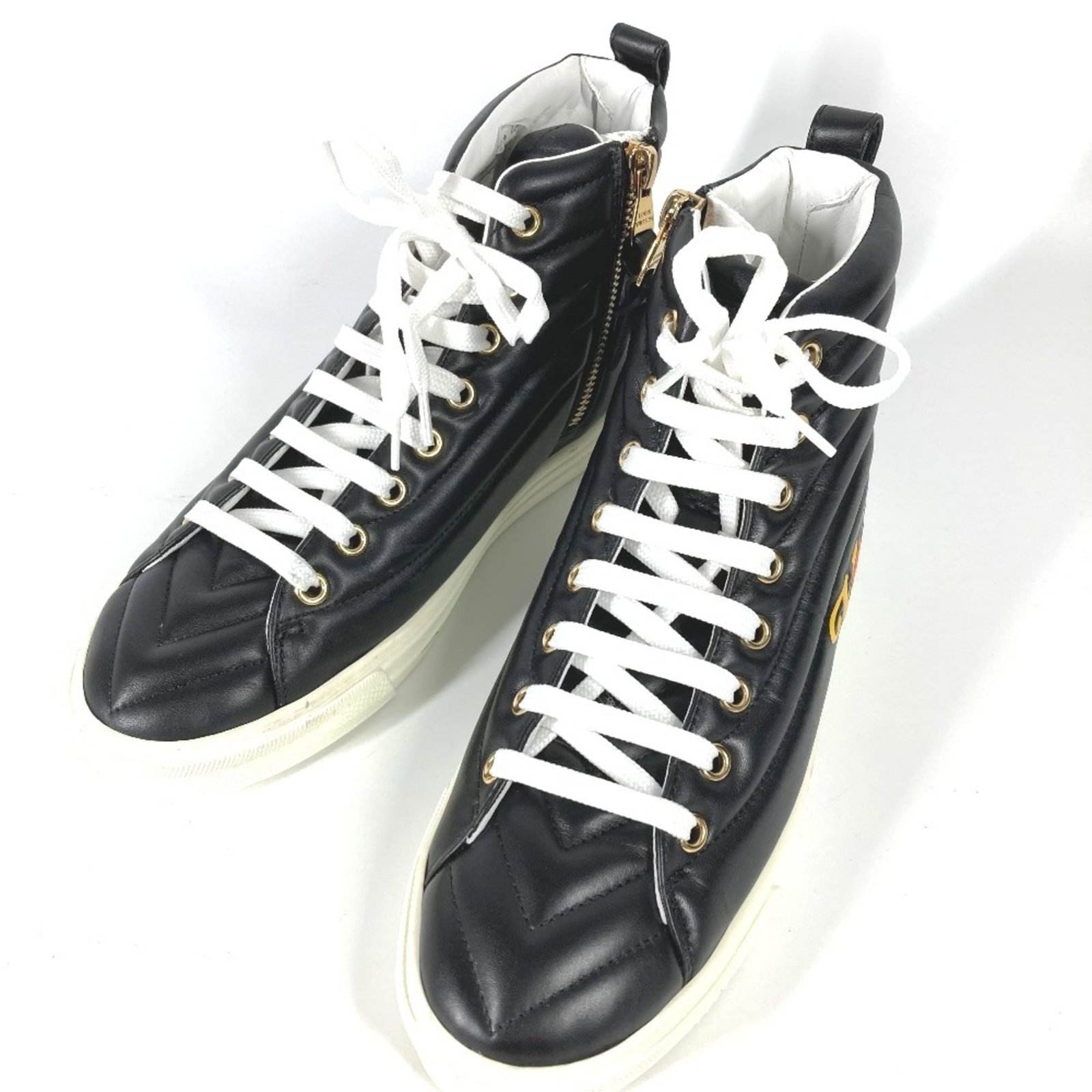 Louis Vuitton sneakers: Louis Vuitton sneakers Women's Louis Vuitton sneakers in black and multi-color, made from leather with breathable design. The shoes feature no padding and are handmade. Available in US size 4.5. Item 