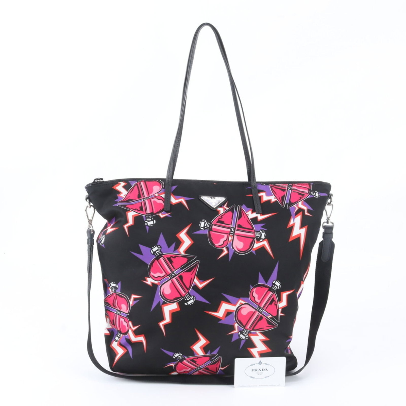 Nylon leather shoulder bag tote nylon leather prada handbag: Nylon leather shoulder bag tote nylon leather prada handbag Nylon leather shoulder bag tote features a sleek design with black and pink color options. Made from high-quality nylon and leather material