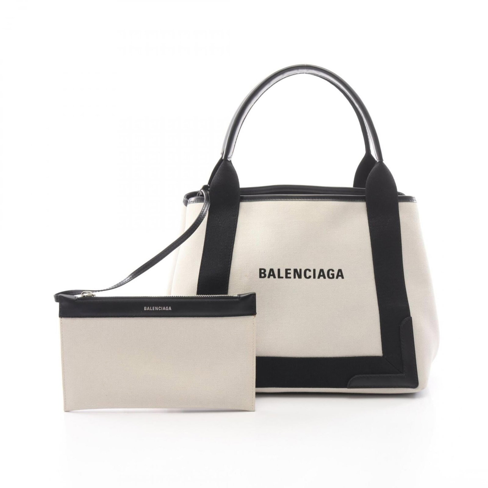 Canvas Leather Balenciaga Bag Pouch Tote: Canvas Leather Balenciaga Bag Pouch Tote Canvas Leather Balenciaga Bag Pouch Tote - A stylish and versatile tote bag made from canvas and leather, featuring a sleek black and ivory color combination.