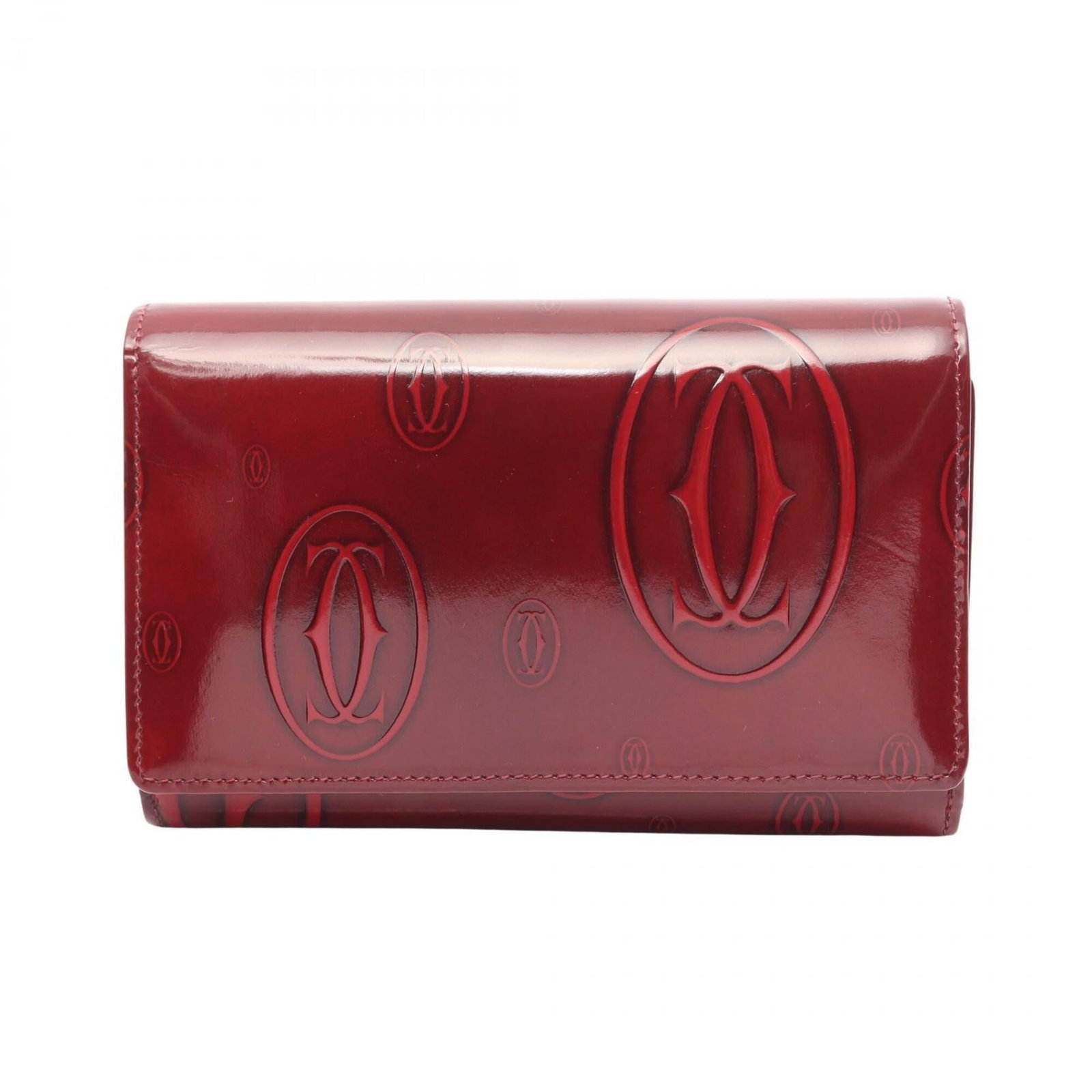 Patent Leather Bi Fold Cartier Wallet: Patent Leather Bi Fold Cartier Wallet Patent leather Cartier bi-fold wallet in Bordeaux color, measuring 9.5cm x 14.5cm x 3cm. This elegant design features a classic fold and patent leather finish tha