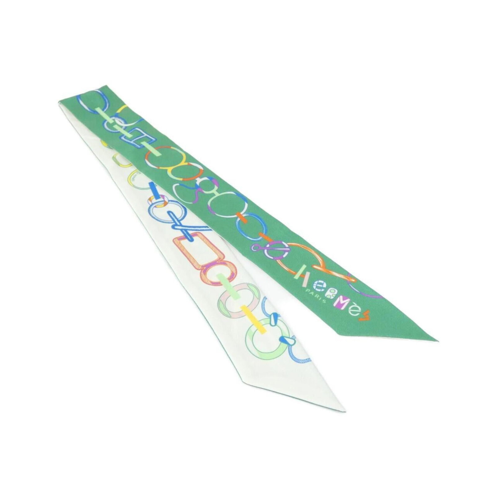 Hermes Silk Scarf: Hermes Silk Scarf Silk scarf from renowned brand Hermes, featuring a vibrant green and white color combination. Made from high-quality silk with dimensions of 5cm x 86cm, this accessory adds a touch o