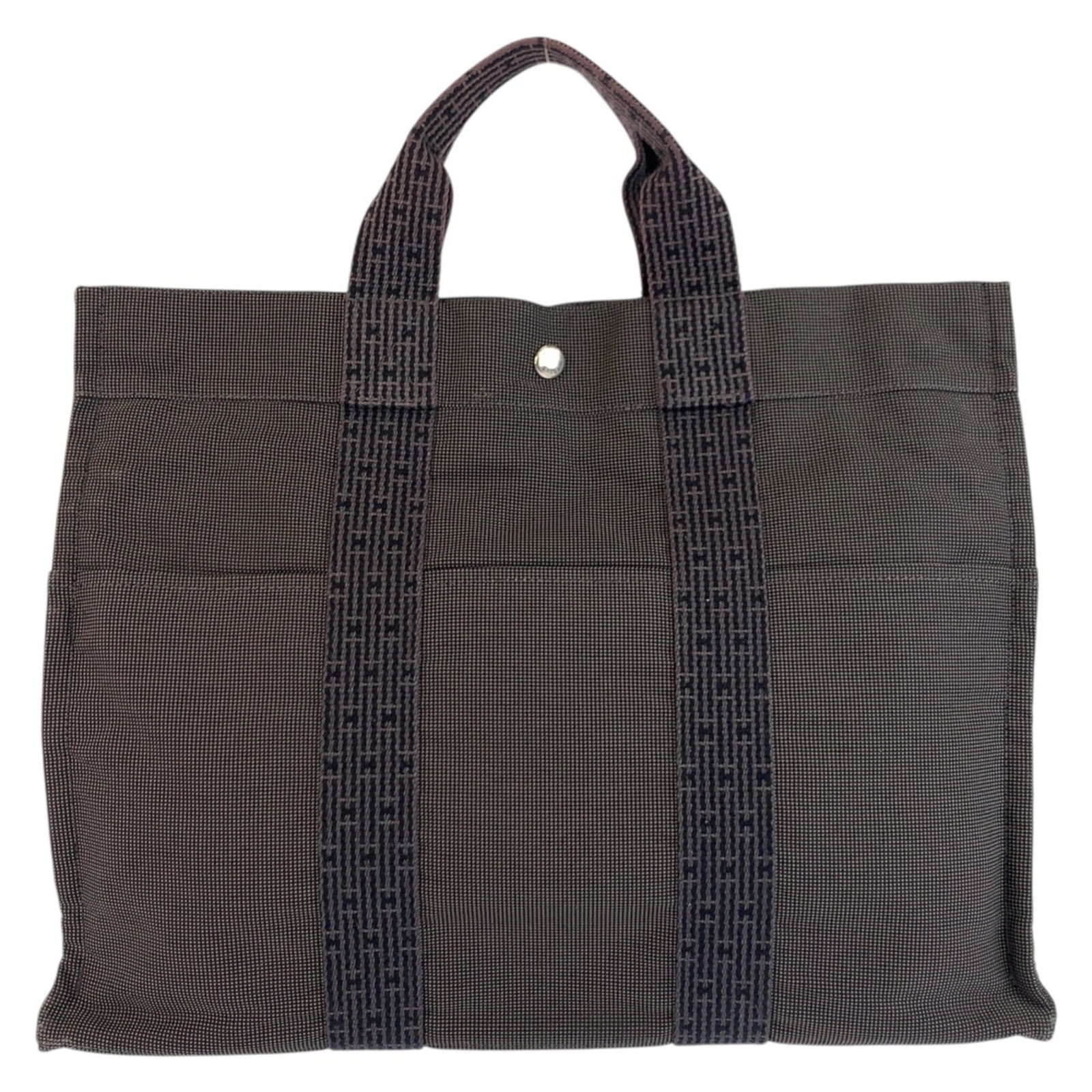 Polyester Polyamide Handbag Tote Hermes: Polyester Polyamide Handbag Tote Hermes Polyester Polyamide Handbag Tote Hermes - A stylish and versatile tote bag from France, crafted with polyamide and polyester materials in a sleek gray color.