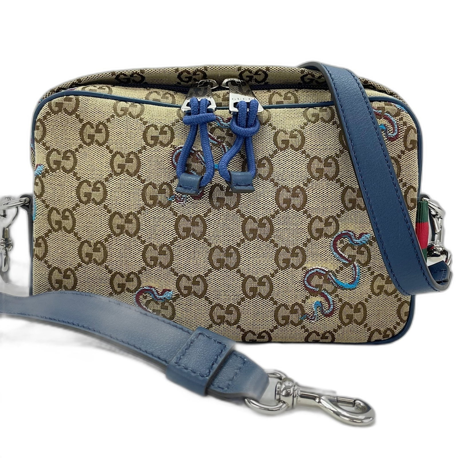 Shoulder Bag Gucci Embroidery: Shoulder Bag Gucci Embroidery The Gucci Embroidery Shoulder Bag boasts a rich, brown embroidery design that adds a touch of elegance to its compact size. Measuring just 15cm x 23cm x 4cm, this