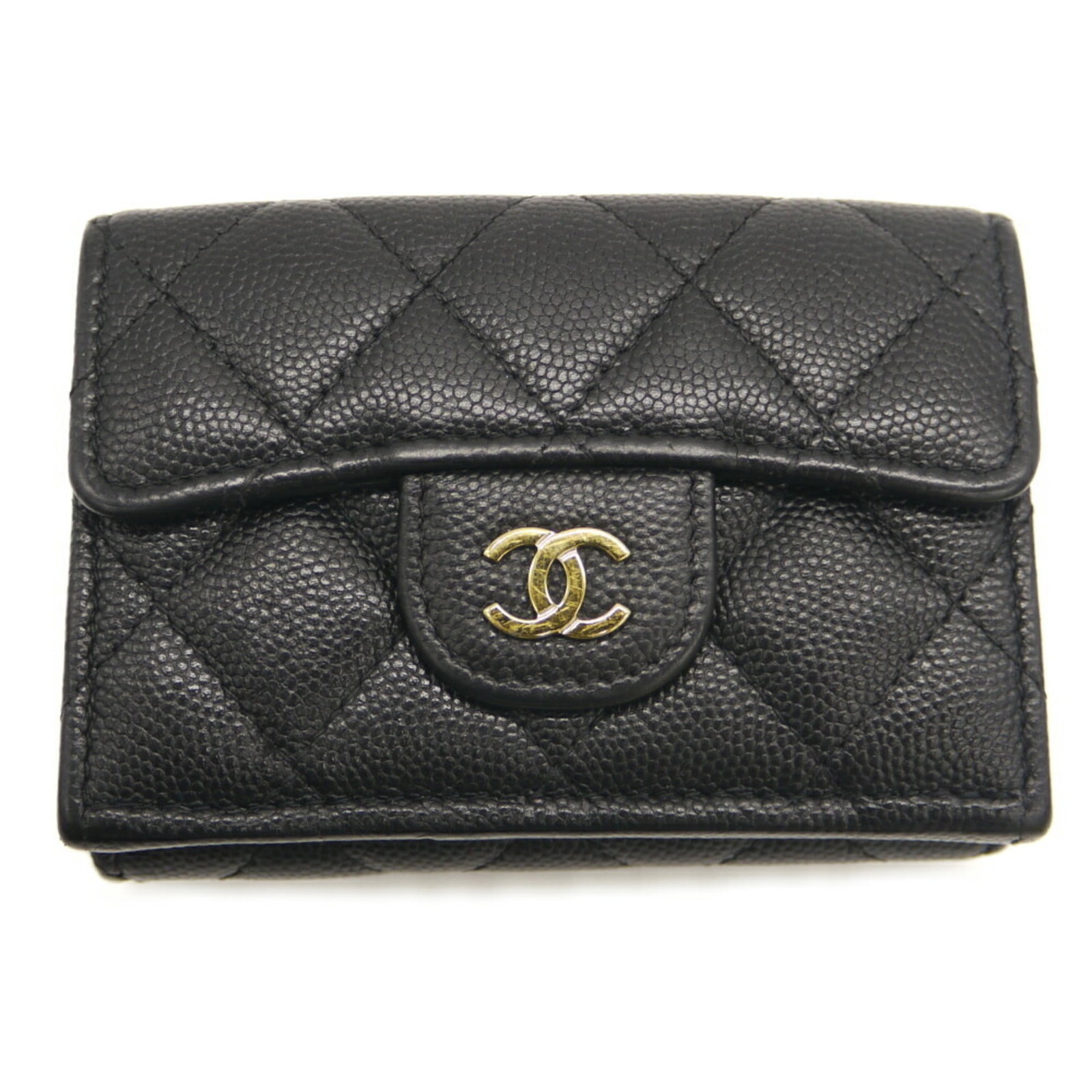 Calfskin wallet tri-fold grained by Chanel: Calfskin wallet tri-fold grained by Chanel Calfskin wallet tri-fold from Chanel, featuring grained material and a sleek black finish. This stylish accessory includes a box and dust bag for added