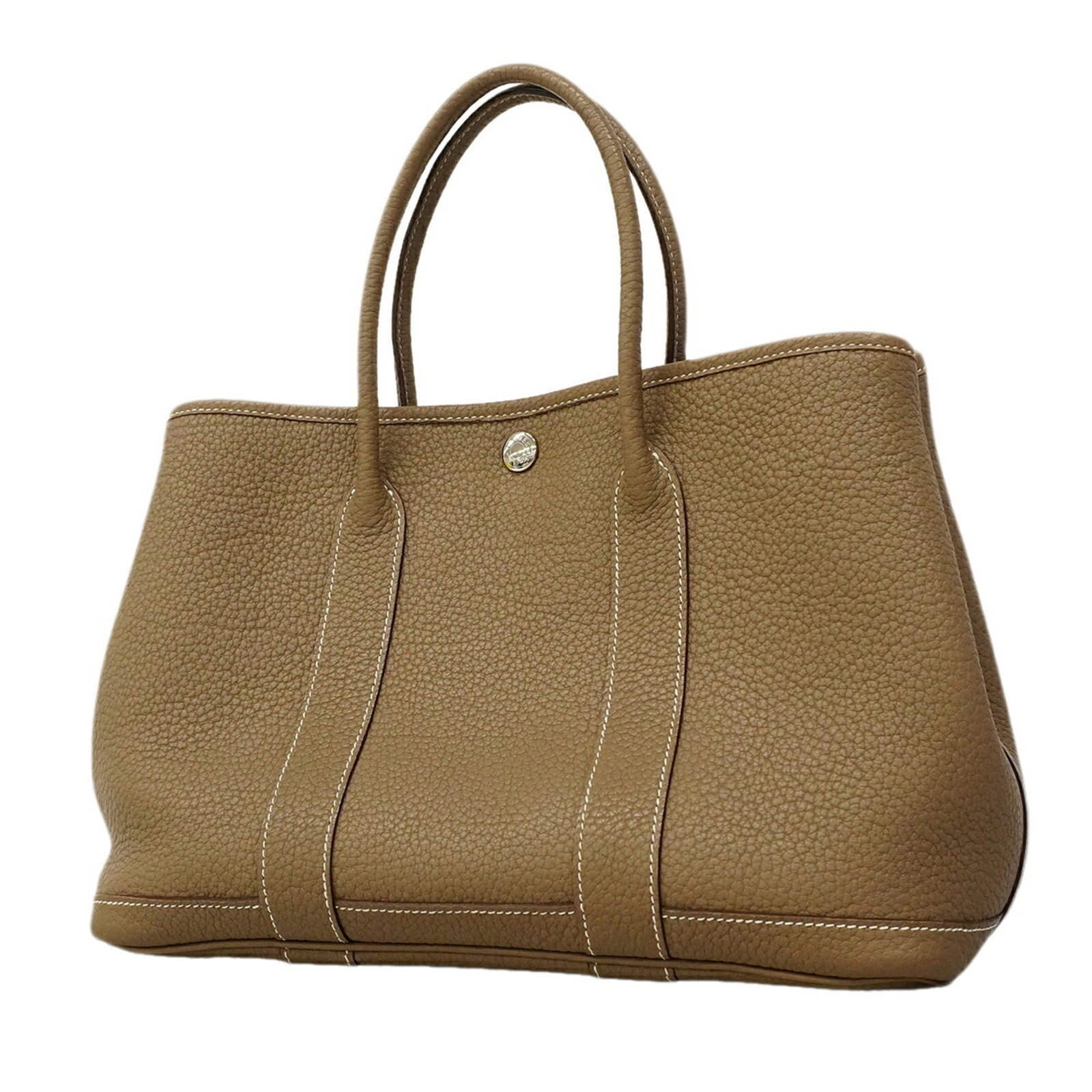 Hermes Tote Bag Negonda Leather: Hermes Tote Bag Negonda Leather The Hermes Tote Bag Negonda Leather boasts sleek, sophisticated design with its Etoupe gray color and silver hardware. Made from high-quality Negonda leather, this tote
