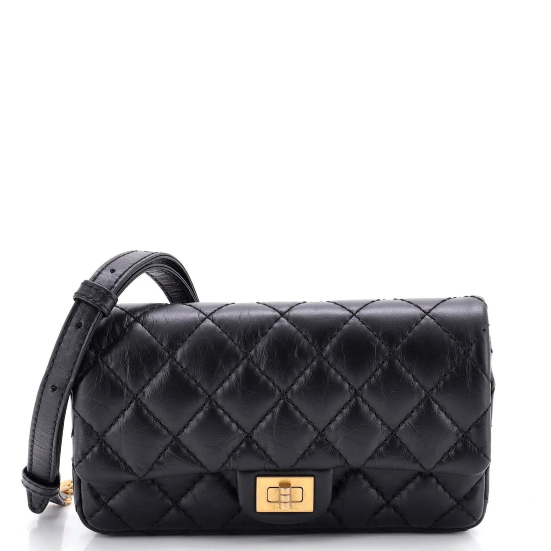 Calfskin quilted bag belt aged Chanel Reissue 2.55: Calfskin quilted bag belt aged Chanel Reissue 2.55 Aged Chanel Reissue 2.55 belt bag in black calfskin leather, featuring quilted design and gold hardware. Minor corner wear and scuffs on the exterior