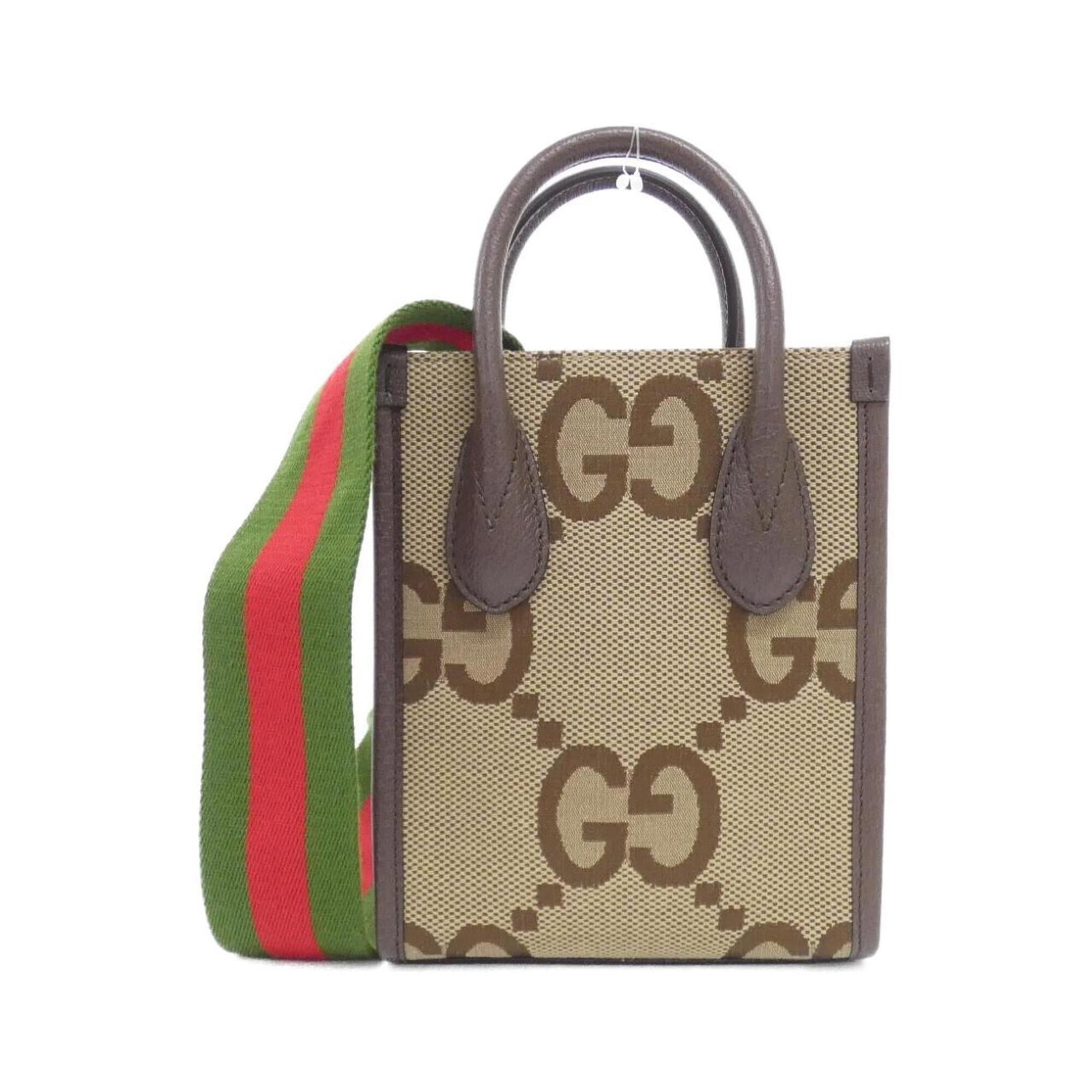 Gucci Handbag Gg Canvas Leather: Gucci Handbag Gg Canvas Leather Gucci's iconic GG canvas leather handbag boasts a timeless design with a brown, camel-colored exterior. Made from high-quality materials, the bag measures 20cm x 16cm x
