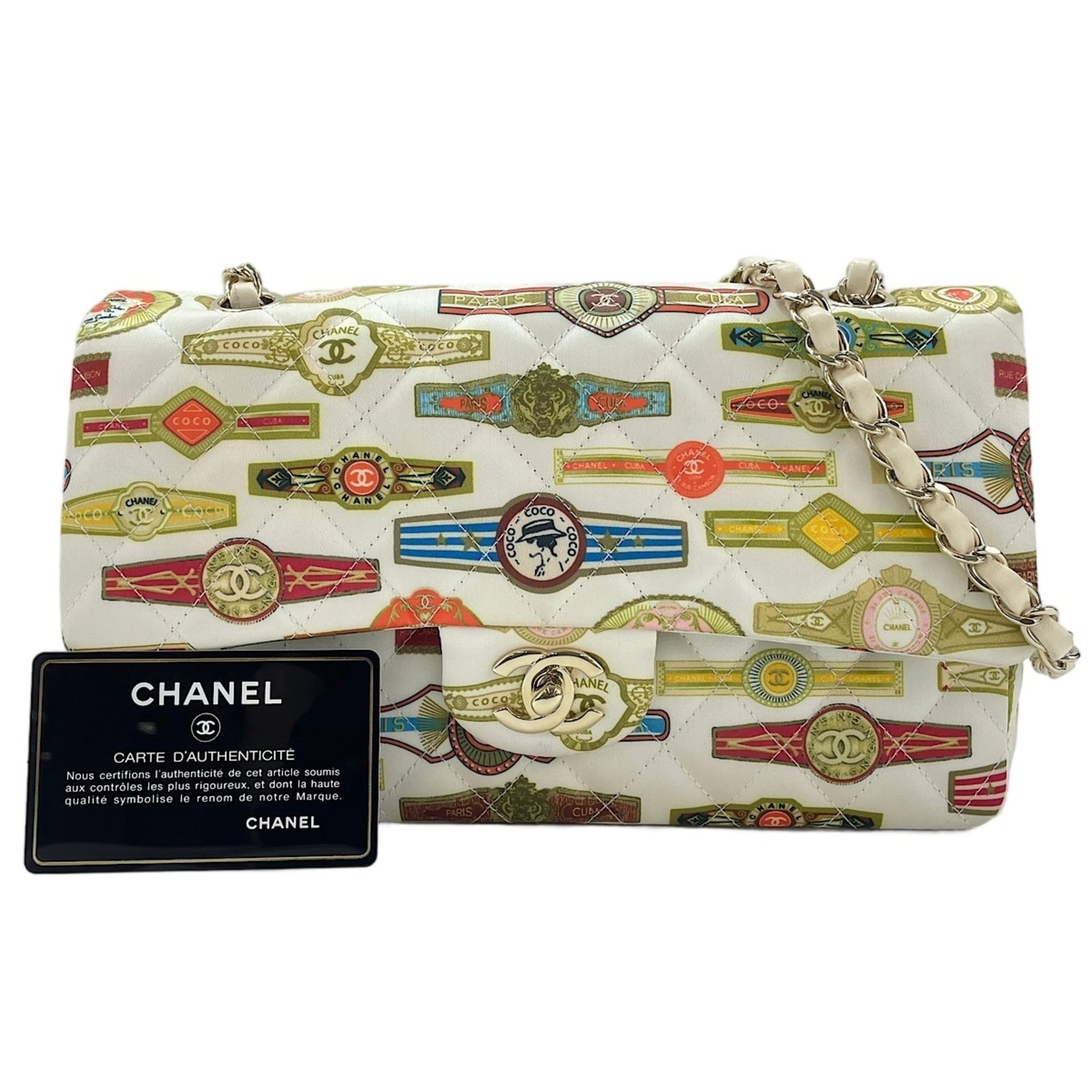Shoulder Bag by Chanel: Shoulder Bag by Chanel Chanel's white shoulder bag boasts sleek lines and a timeless design, with a compact size that fits perfectly in the hand. Measuring just 15cm x 25cm x 6cm, it features a stylis