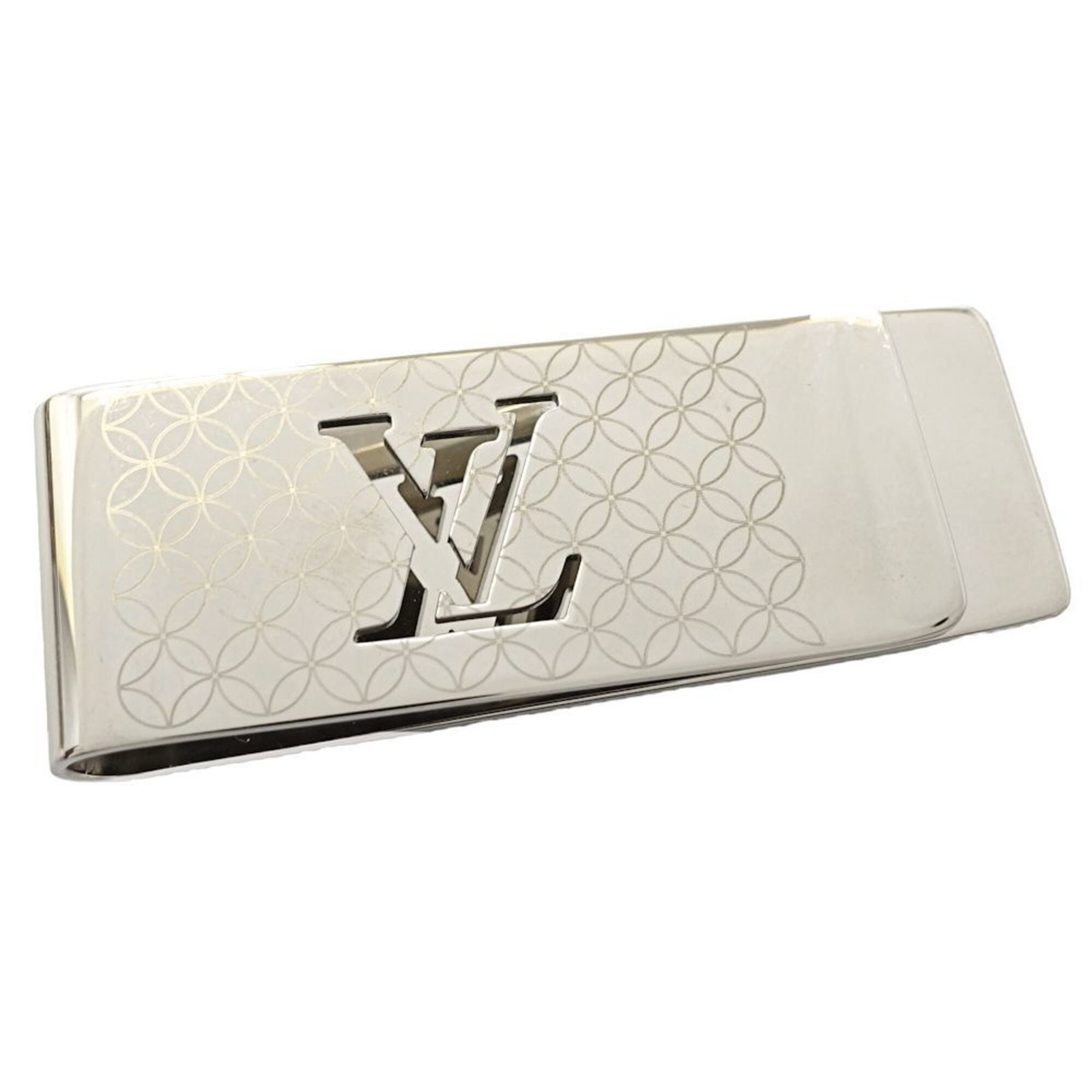 Money Clip Louis Vuitton Metal: Money Clip Louis Vuitton Metal Silver Louis Vuitton Metal Money Clip with Distinctive Design. The money clip measures 2.5cm x 6.5cm and features a sleek, metallic silver finish. Its compact size makes