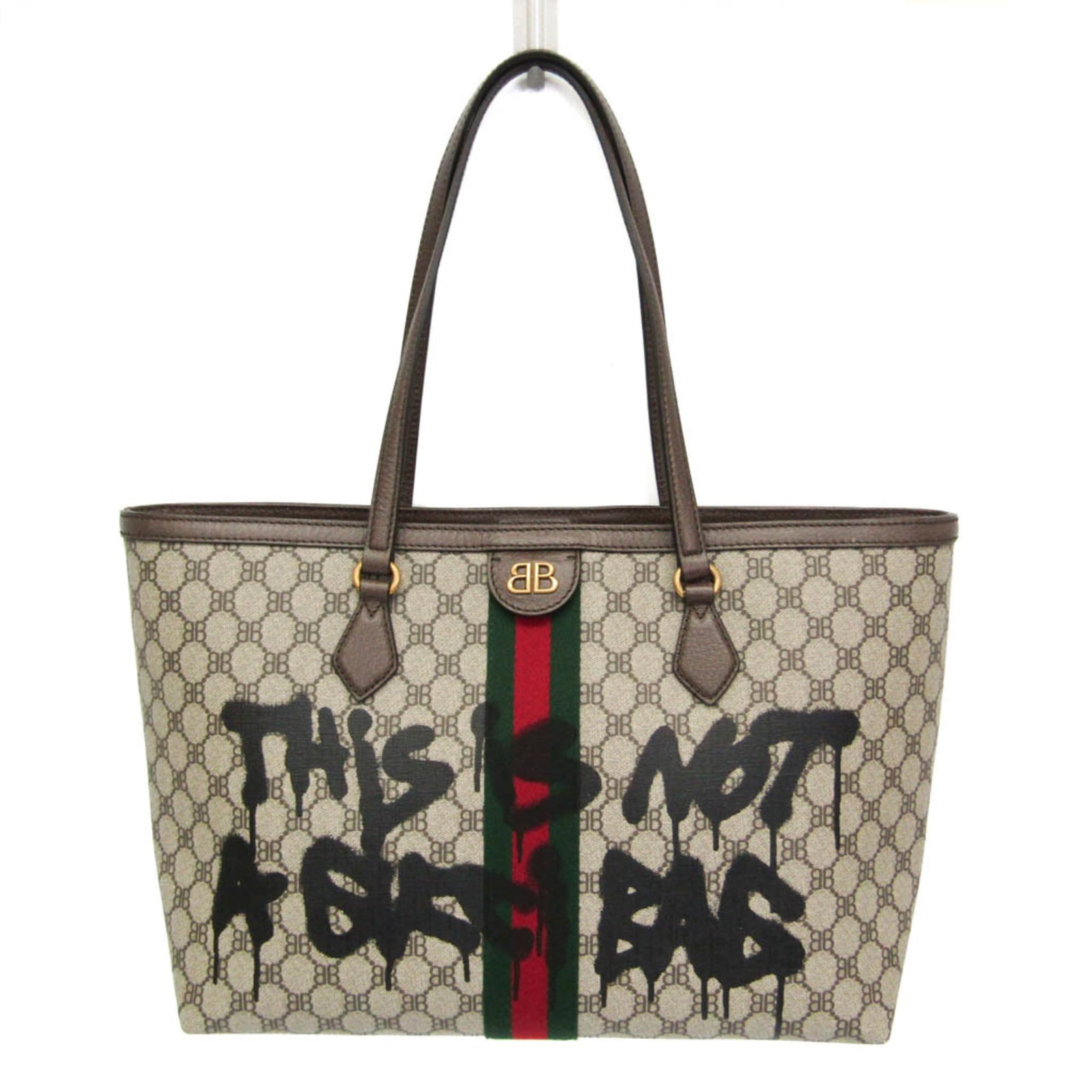 Canvas Leather Gucci Bag Tote Coated: Canvas Leather Gucci Bag Tote Coated Coated canvas and leather come together in this Gucci x Balenciaga Hacker Project tote bag, featuring a magnetic snap closure and two pockets for organization.