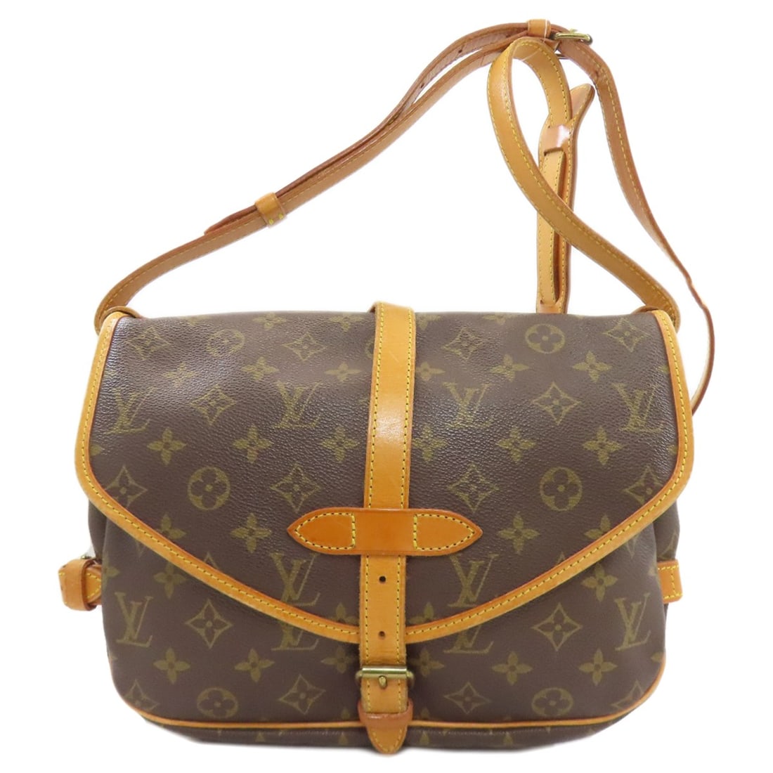 Canvas Monogram Saumur Louis Vuitton Mm M40710 Shoulder Bag: Canvas Monogram Saumur Louis Vuitton Mm M40710 Shoulder Bag Brown Monogram Canvas Louis Vuitton Shoulder Bag. This LOUIS VUITTON Mm M40710 shoulder bag features the iconic monogram canvas exterior in