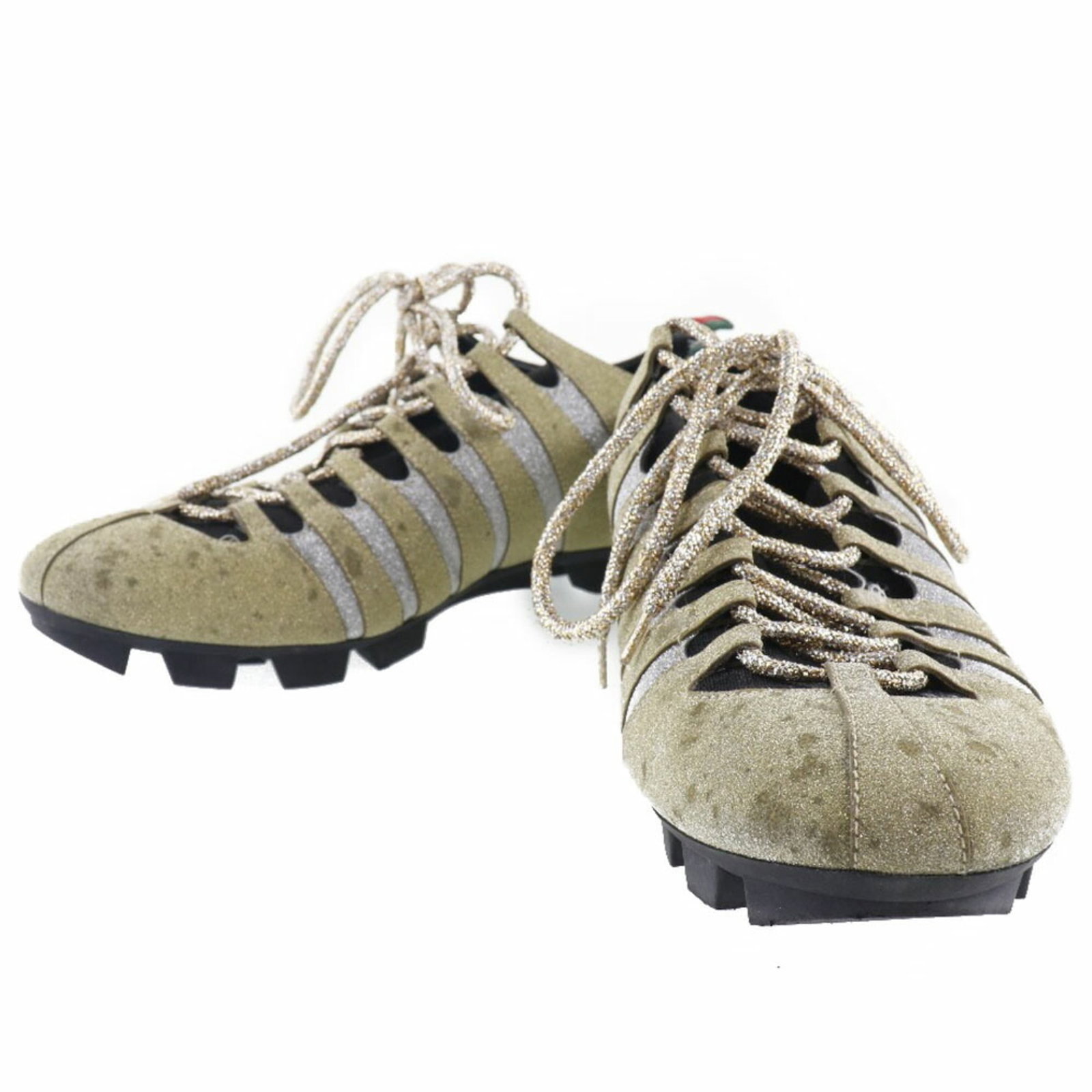 Sneakers by Gucci: Sneakers by Gucci Gold Gucci sneakers in US size 7.5 come with original box and dust bag, providing a complete package for the buyer. The item bears a signature but its origin cannot be confirmed.