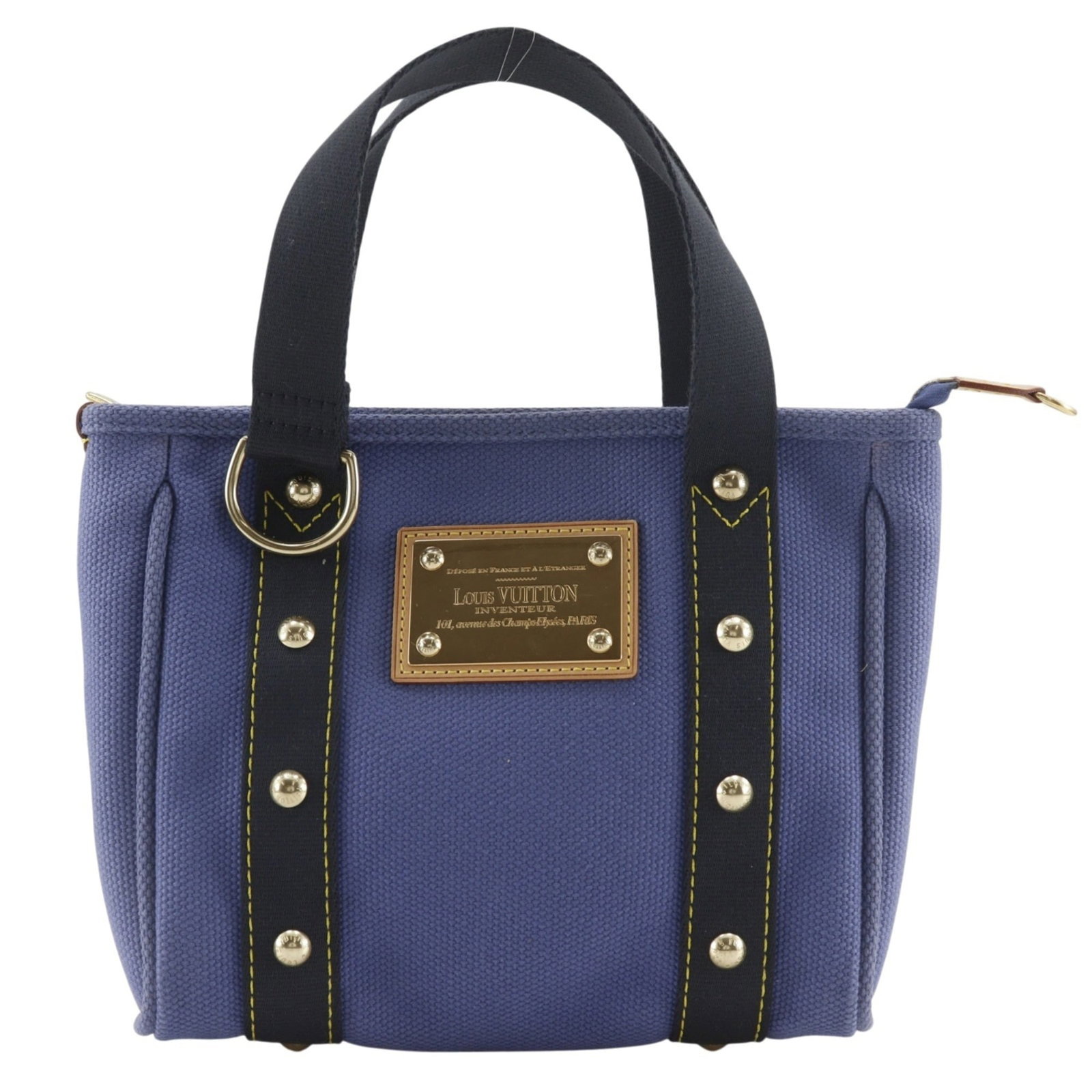 Handbag Canvas from Louis Vuitton: Handbag Canvas from Louis Vuitton Canvas from Louis Vuitton, featuring the iconic M40090 design, boasts a rich purple hue. This compact handbag measures 20cm x 24cm x 6cm and is crafted from