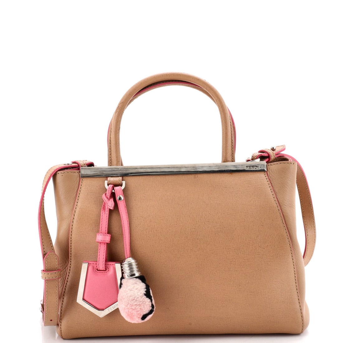 Fendi 2Jours Bag Leather Petite: Fendi 2Jours Bag Leather Petite The Fendi 2Jours Bag Leather Petite boasts a rich, brown leather exterior with subtle signs of wear and scuffs. This petite bag features a classic top handle design and