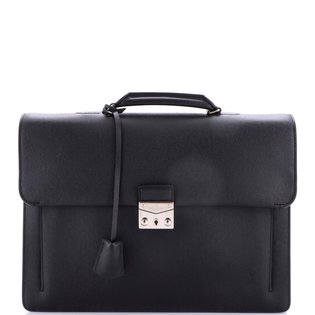 Louis Vuitton Associe Cartable 2 Briefcase Taiga Leather: Louis Vuitton Associe Cartable 2 Briefcase Taiga Leather The Louis Vuitton Associe Cartable 2 Briefcase Taiga Leather boasts sleek black leather exterior and interior, complemented by silver hardware.