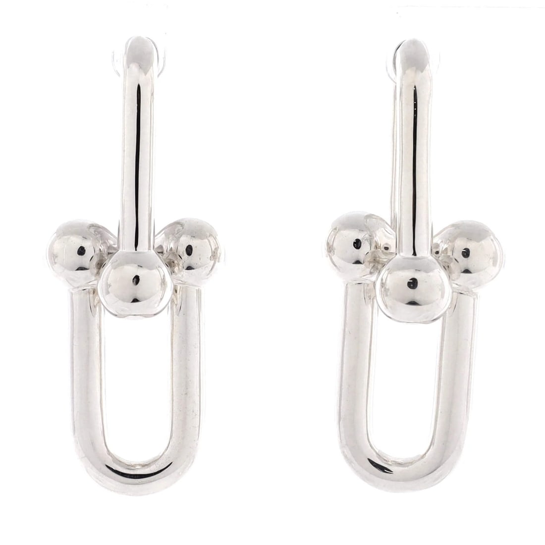 Sterling silver earrings from Tiffany and Co hardwear link: Sterling silver earrings from Tiffany and Co hardwear link Sterling silver earrings from Tiffany & Co's Hardwear Link collection, featuring a sleek and modern design with a subtle silver finish. The