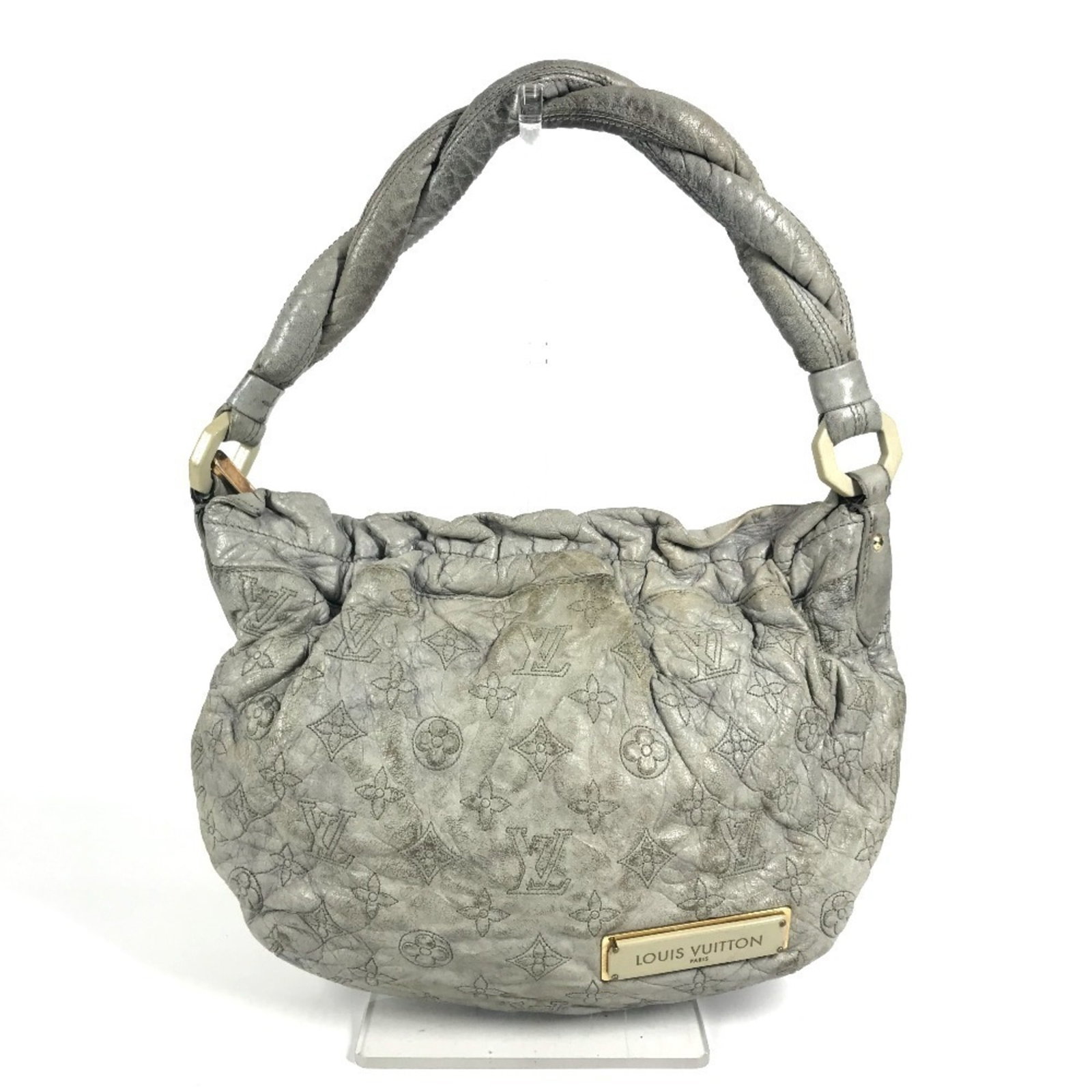 Louis Vuitton Handbag Shoulder Bag Leather: Louis Vuitton Handbag Shoulder Bag Leather The Louis Vuitton Nimbus PM shoulder bag features a timeless ecru, galle, and gray leather exterior with gold hardware. This stylish handbag boasts an open