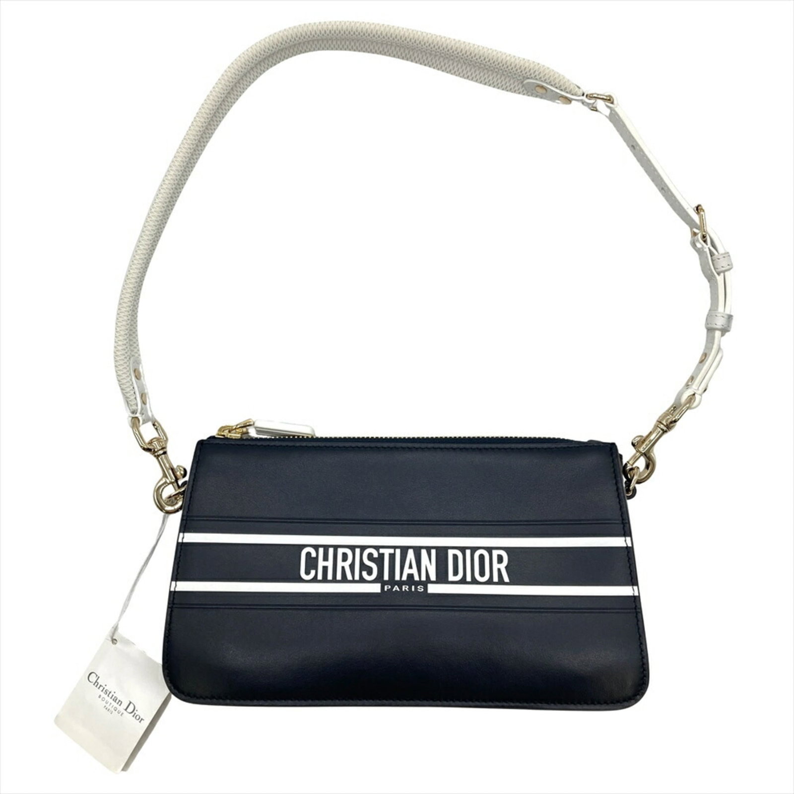 Shoulder bag leather by Christian Dior: Shoulder bag leather by Christian Dior This navy leather shoulder bag by Christian Dior boasts classic style with clean lines, featuring gold hardware and a zipper closure. With its spacious open
