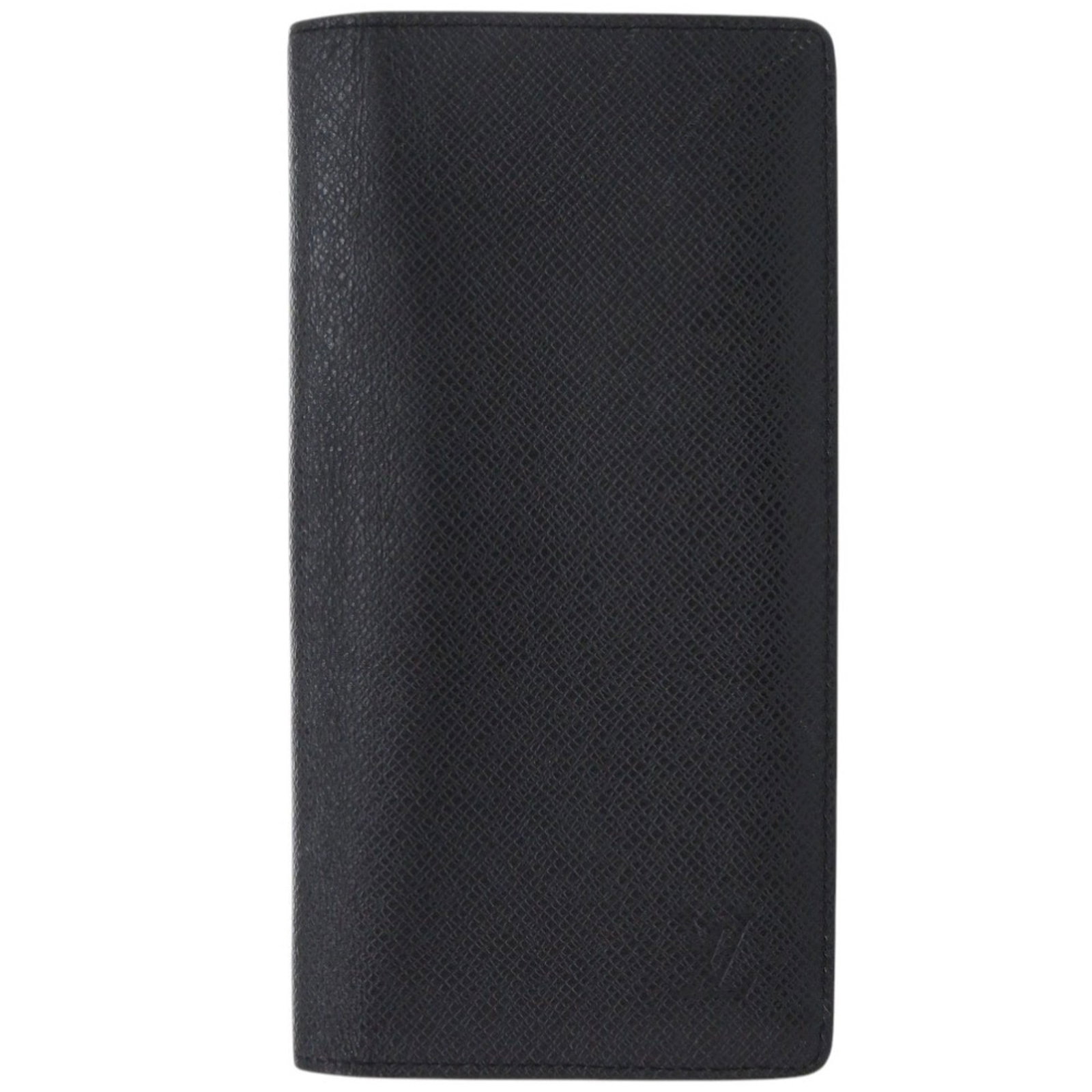 Long Wallet Bi Fold Leather Taiga Louis Vuitton: Long Wallet Bi Fold Leather Taiga Louis Vuitton Taiga leather in black, Noir, gives this bi-fold long wallet from Louis Vuitton its sleek and sophisticated look. With dimensions of 19cm x 10cm x 2cm,