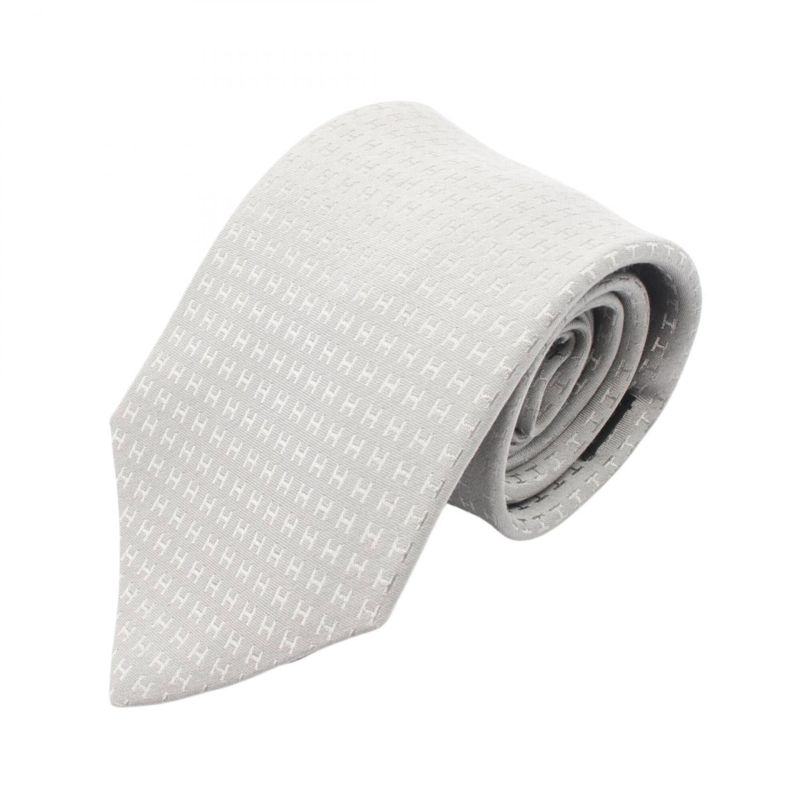 Hermes Cravat Silk: Hermes Cravat Silk Silk cravat from Hermes, measuring 147cm in length. Made from high-quality silk material, this cravat features a classic gray color. A stylish accessory for formal occasions. Item S
