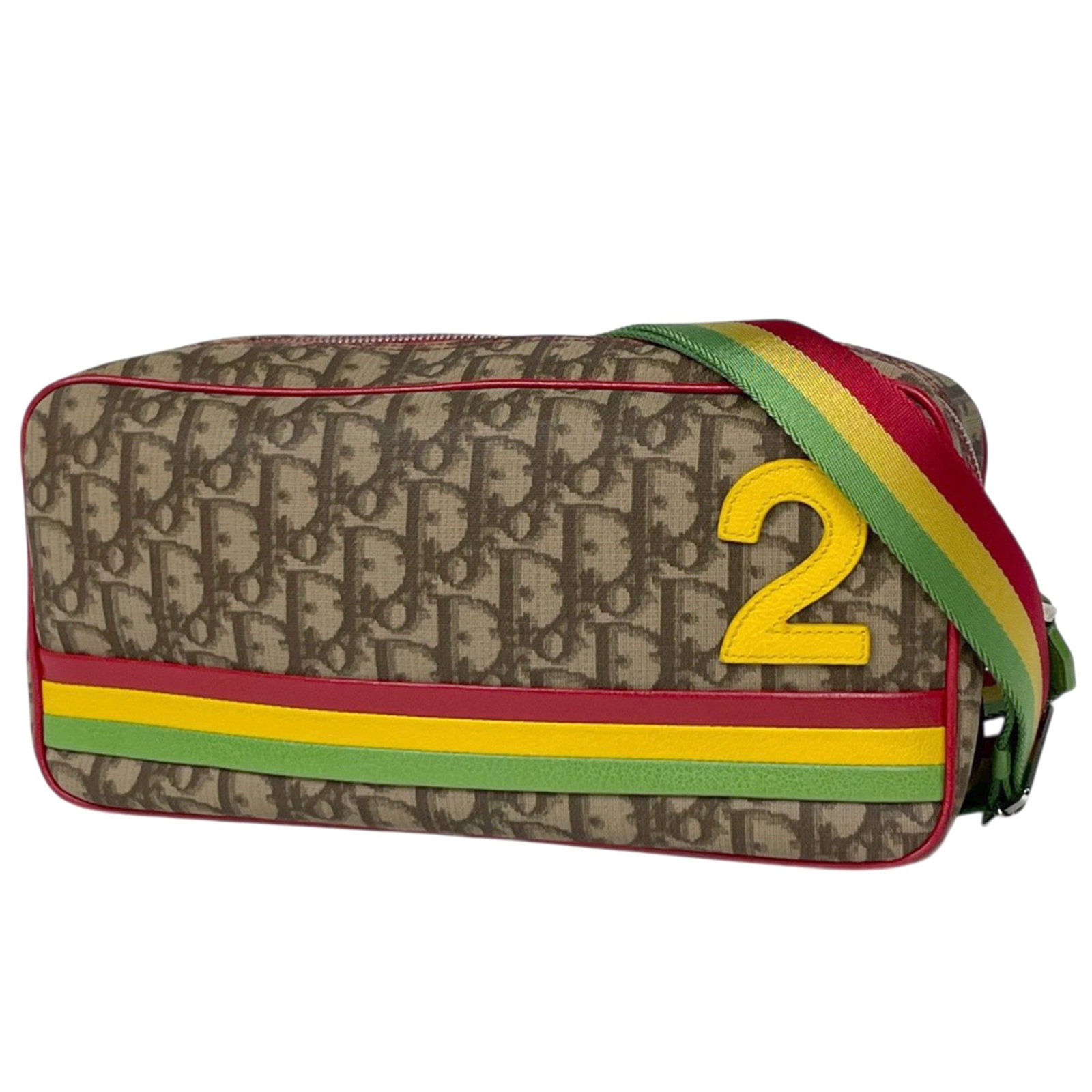Christian Dior Shoulder Bag Coated Canvas Leather: Christian Dior Shoulder Bag Coated Canvas Leather Coated canvas and leather come together in a stylish shoulder bag from Christian Dior's Trotter line, available in brown, multi-color, and red hues.