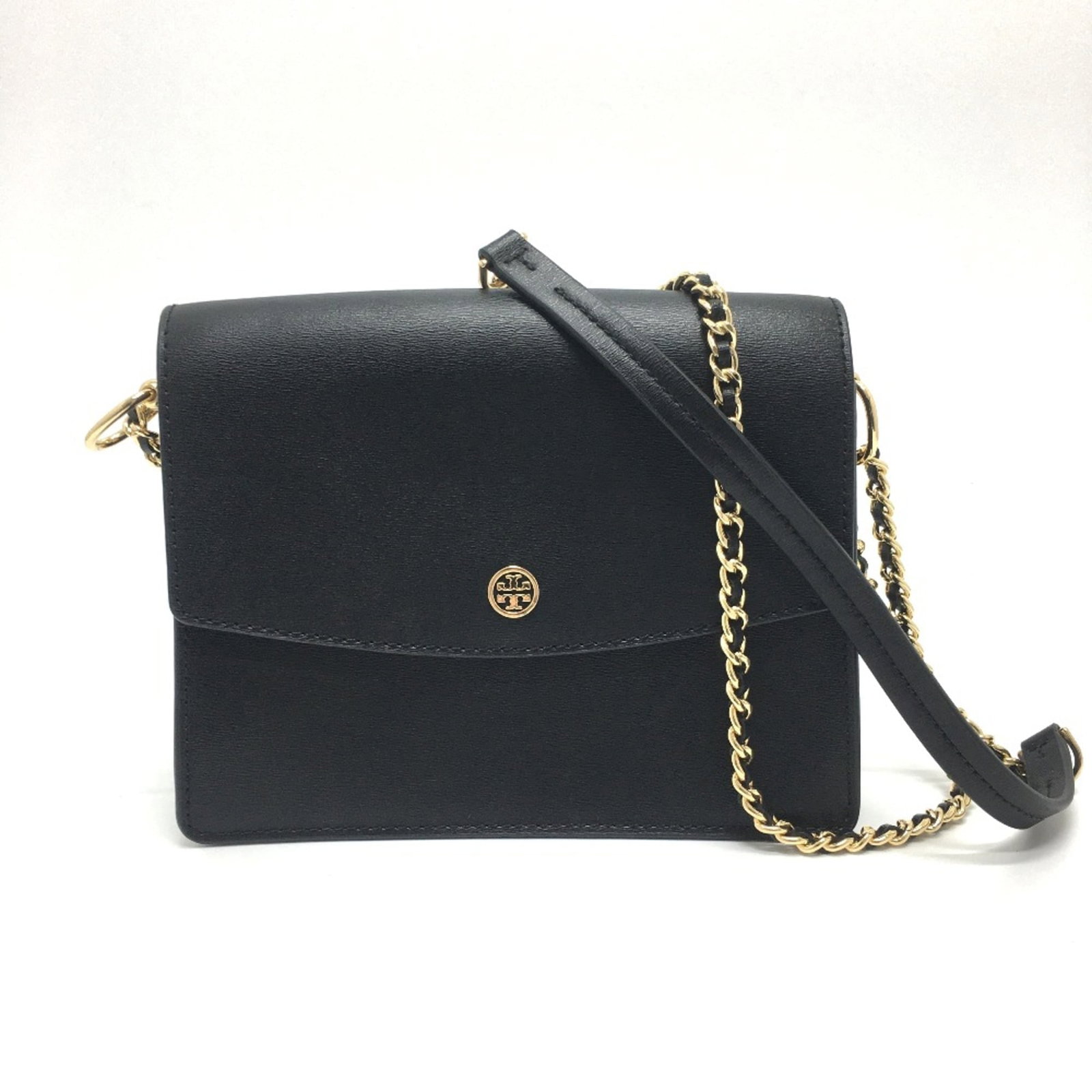 Shoulder bag leather by Tory Burch: Shoulder bag leather by Tory Burch Black leather shoulder bag from Tory Burch, measuring 21cm x 17.5cm x 7.5cm and featuring a signature. This stylish bag has a long shoulder strap that reaches 44.9