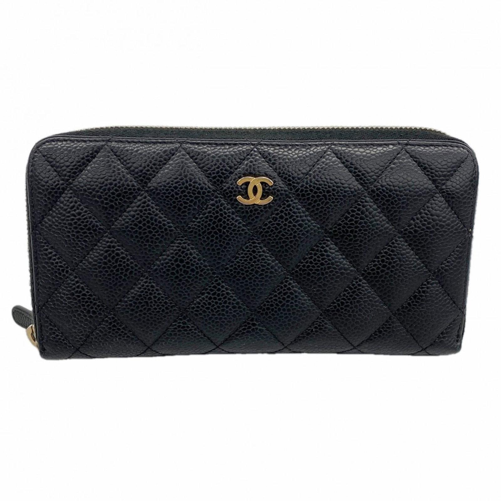 Calfskin long bi-fold wallet from Chanel: Calfskin long bi-fold wallet from Chanel Calfskin long bi-fold wallet from Chanel boasts sleek, sophisticated design with its black grained finish. Made from high-quality material, the wallet