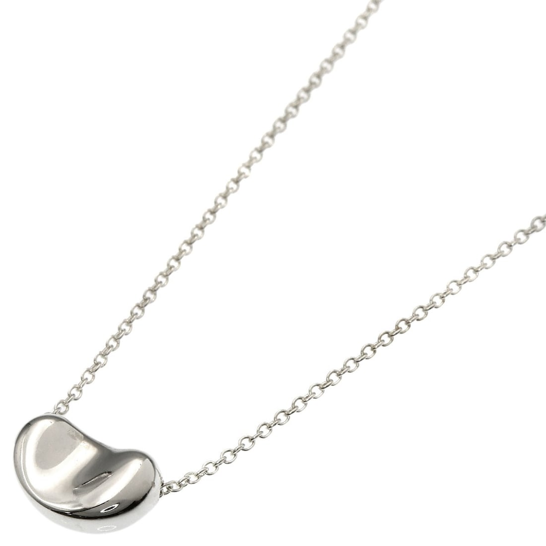 Tiffany Co Bean Silver Necklace: Tiffany Co Bean Silver Necklace The Tiffany Co Bean Silver Necklace boasts an elegant design with its silver metal exterior, measuring 15.9 inches in length. Notably, it features no main stone,