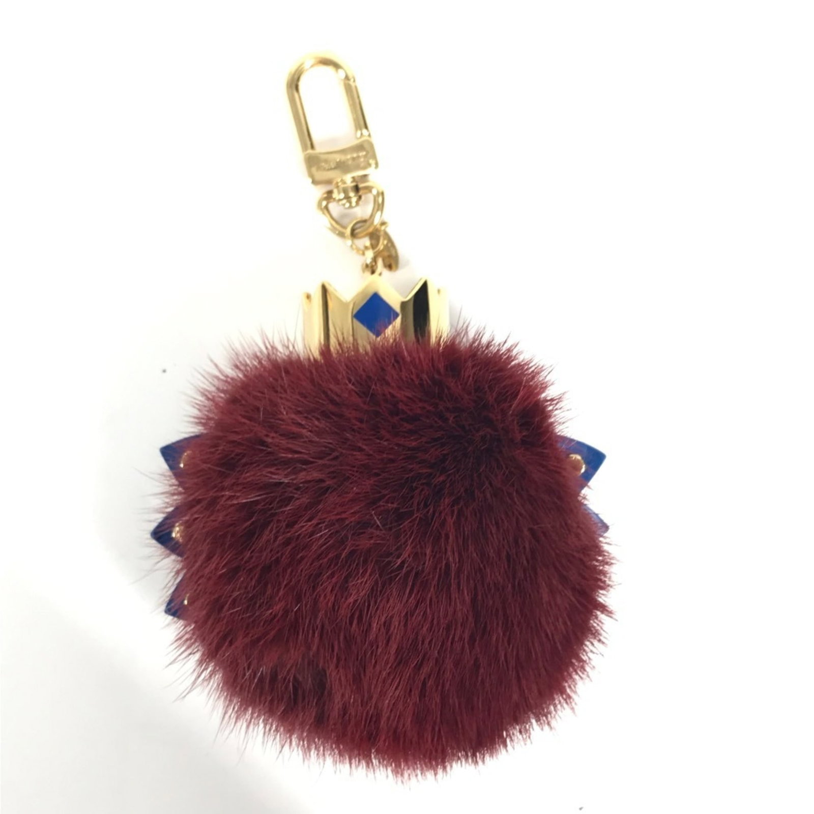 Louis Vuitton Keyring Fur Metal: Louis Vuitton Keyring Fur Metal Red Louis Vuitton Keyring with Mink Fur and Metal Construction, Accompanied by Original Box and Dust Bag. This luxurious keyring boasts a striking red color and feature