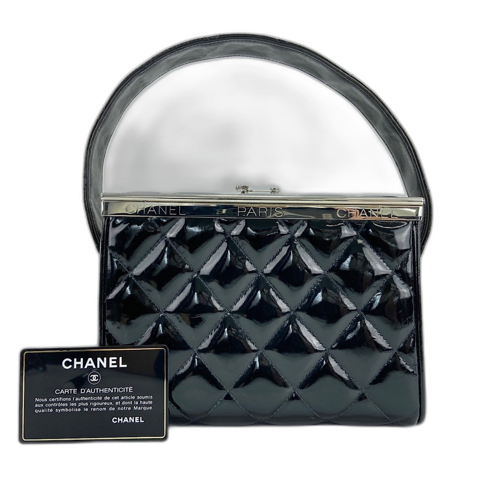 Leather Handbag Chanel: Leather Handbag Chanel Black leather Matelasse handbag from Chanel, measuring 14cm x 19cm x 10cm. Features an enamel finish and a handle drop of 12cm. Made entirely of high-quality leather. Item Speci