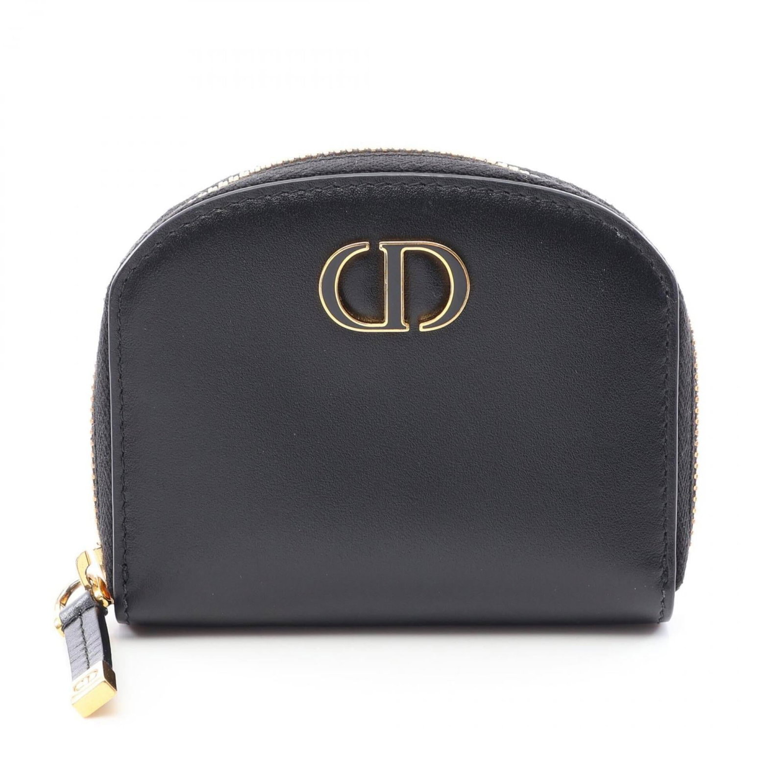 Christian Dior leather purse case: Christian Dior leather purse case Black leather coin purse case from Christian Dior, measuring 9cm x 11cm x 2.5cm. This sleek and compact design features high-quality leather construction, making it a