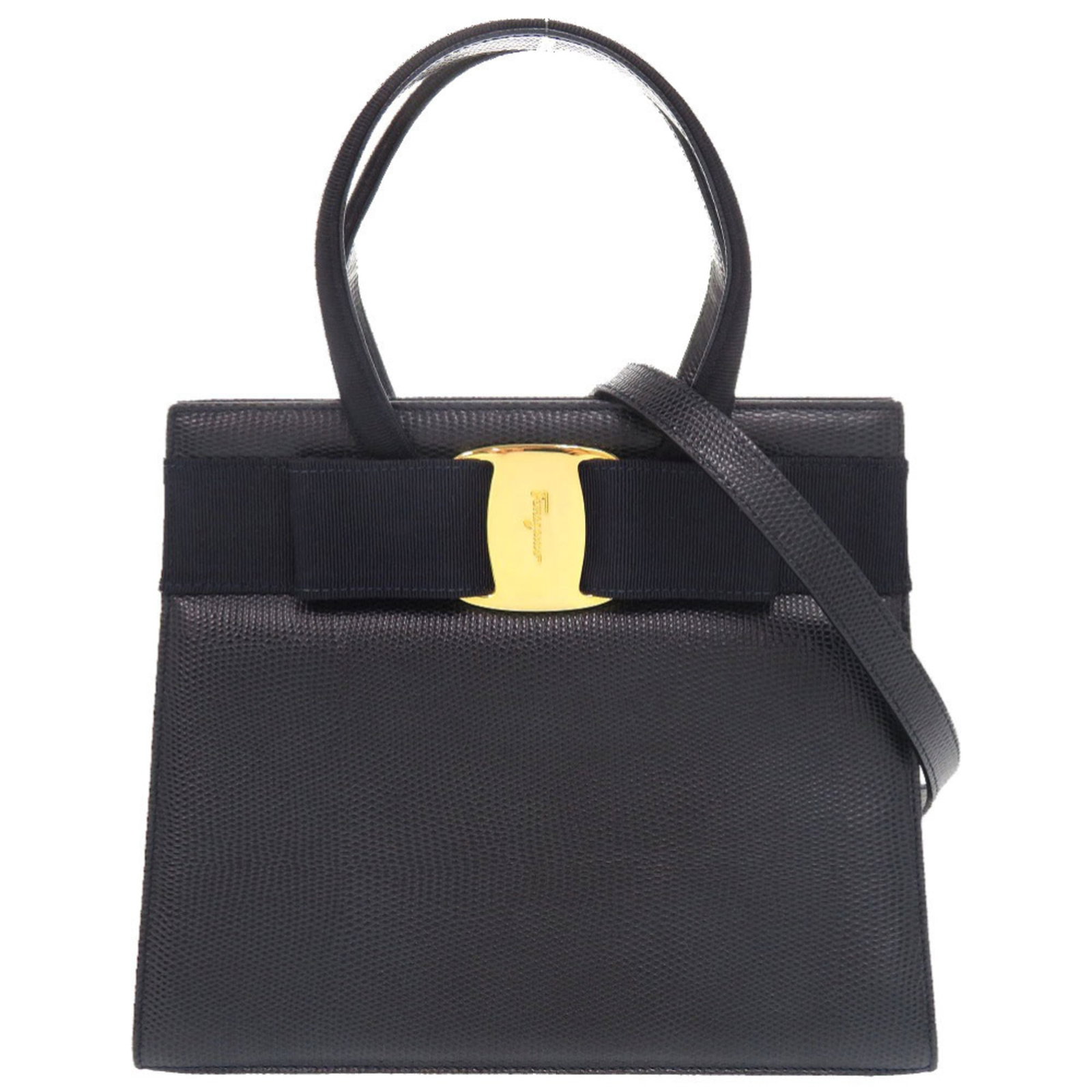 Handbag Salvatore Ferragamo Leather Shoulder: Handbag Salvatore Ferragamo Leather Shoulder This navy leather shoulder bag from Salvatore Ferragamo features embossed leather and measures 20.5cm x 24.5cm x 9.5cm, making it a stylish and compact