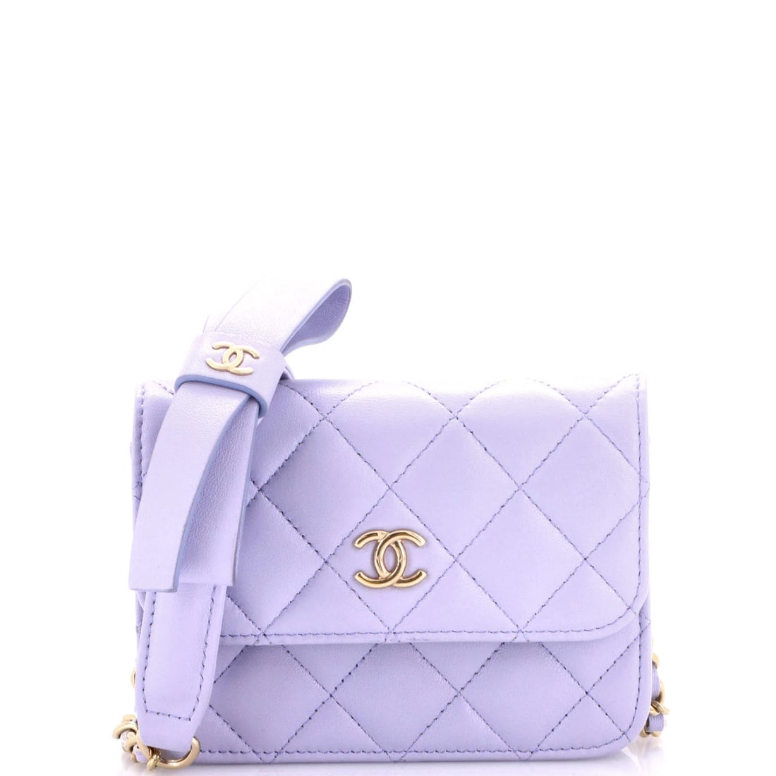 Chanel Bow Strap Card Holder on Chain Quilted Lambskin: Chanel Bow Strap Card Holder on Chain Quilted Lambskin Chanel's Bow Strap Card Holder on Chain Quilted Lambskin boasts a rich purple exterior and gold tone hardware, adding a touch of luxury to any ou