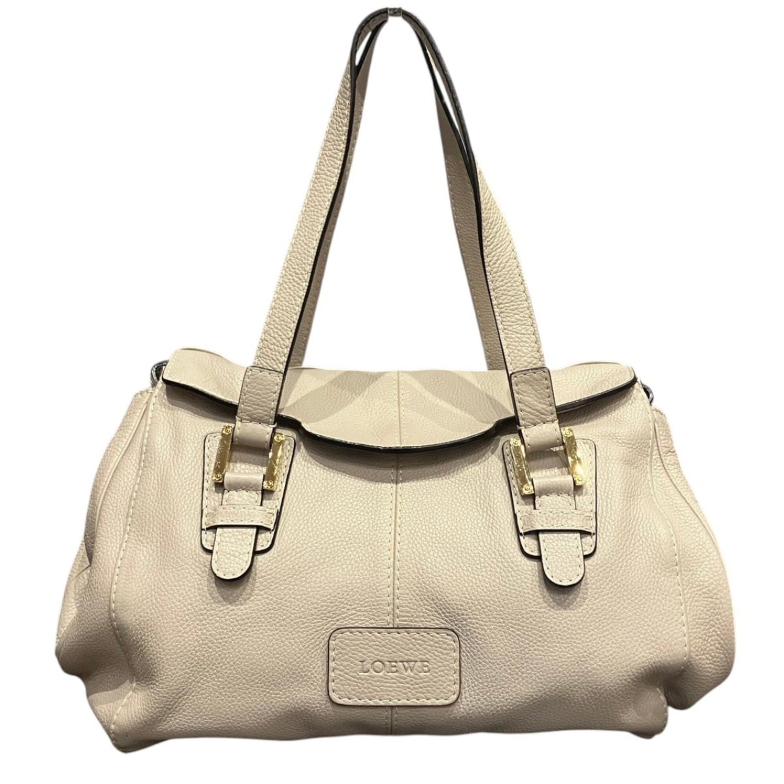 Leather shoulder bag by Loewe: Leather shoulder bag by Loewe The Loewe leather shoulder bag boasts a sleek, grayish hue and a sophisticated design. Measuring 30cm x 37cm x 16cm, it offers ample space for everyday essentials. With