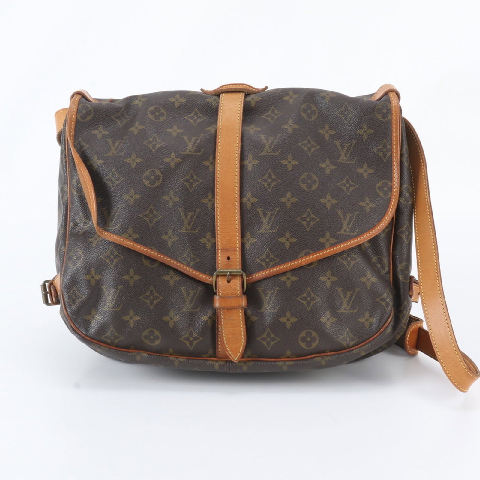 Louis Vuitton Shoulder Bag Leather Coated Canvas: Louis Vuitton Shoulder Bag Leather Coated Canvas The Louis Vuitton Shoulder Bag Leather Coated Canvas boasts a rich, brown color and iconic monogram pattern. Made from high-quality leather and coated