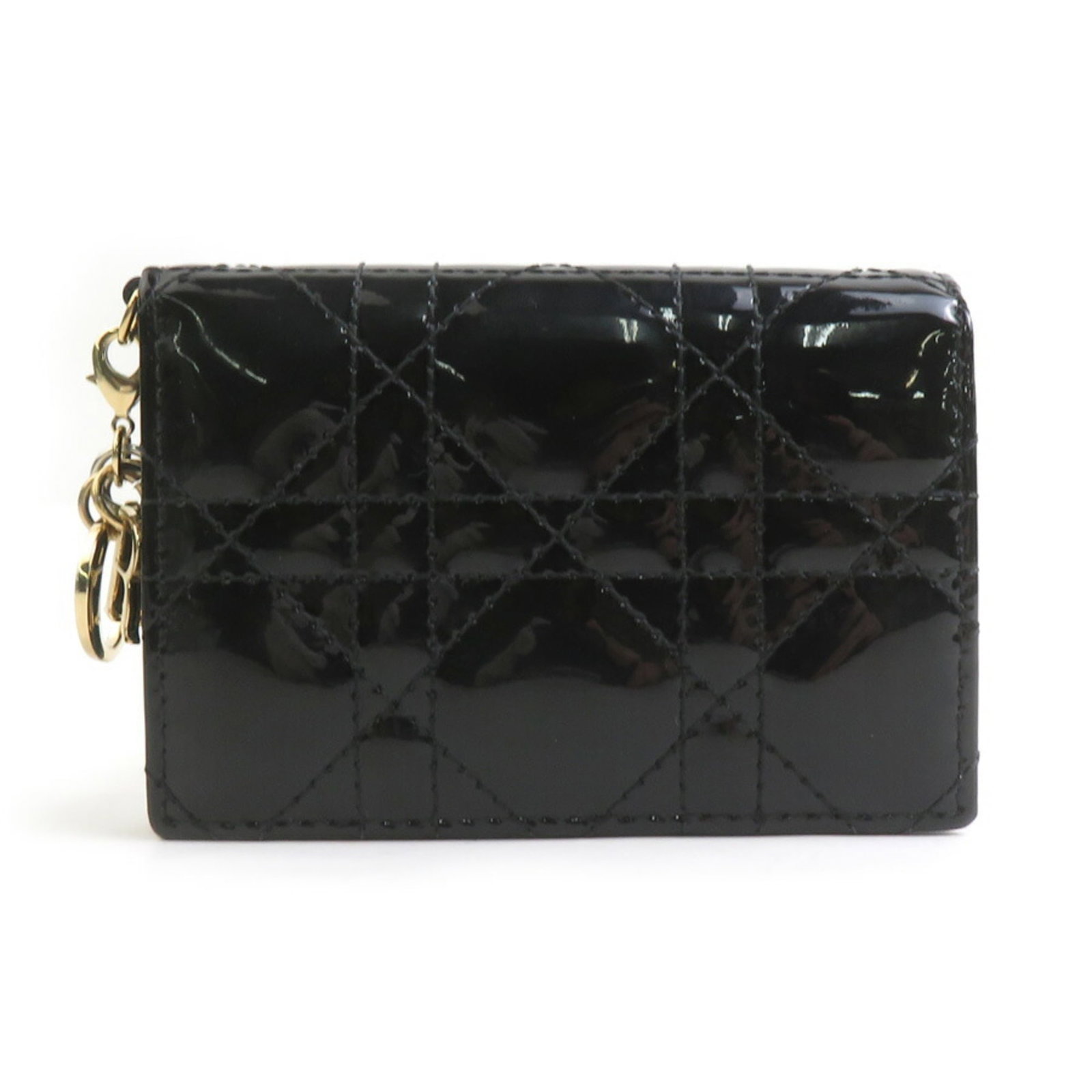 Christian Dior Business Card Case Patent Leather: Christian Dior Business Card Case Patent Leather Christian Dior Business Card Case Patent Leather features a sleek, all-black design crafted from high-quality patent leather. The compact case